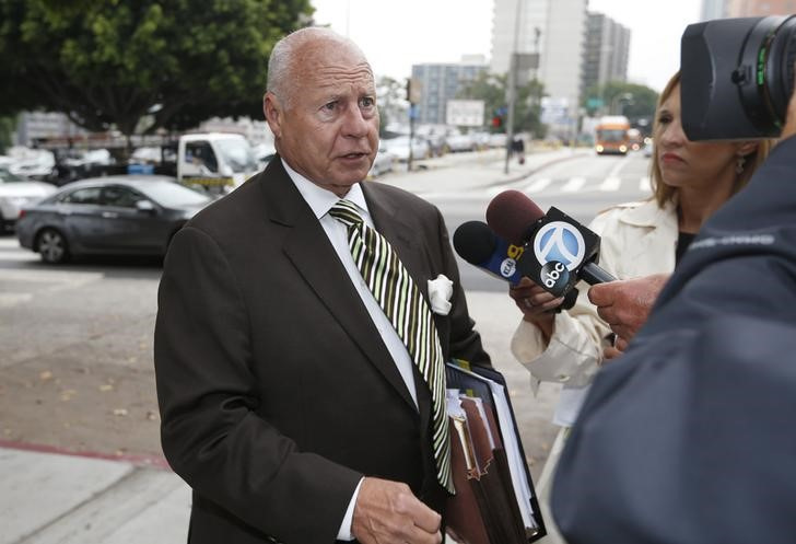 The Stow family attorney Thomas Girardi is interviewed before his client San Francisco Giants fan Bryan Stow arrives at a Los Angeles Court the day before closing arguments in a civil trial in a lawsuit brought by Stow against former Los Angeles Dodgers o