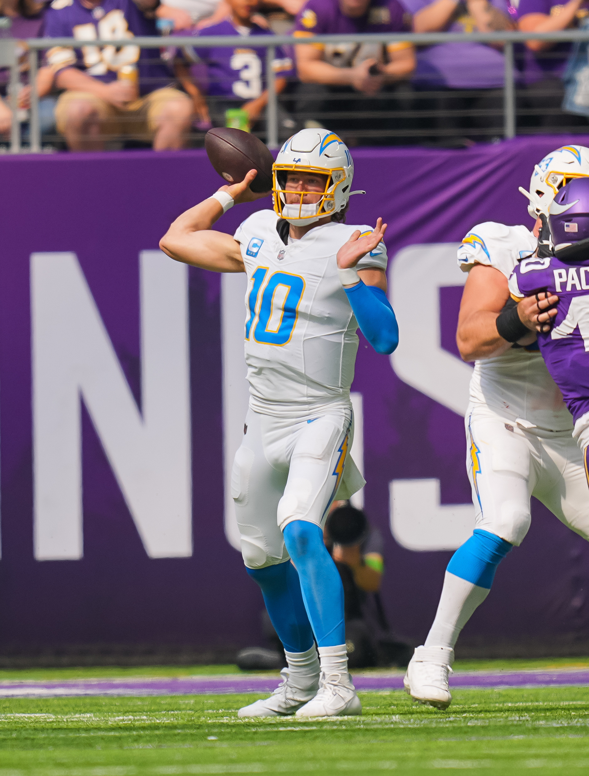 Chargers survive cliff-hanger with Vikings on end zone pick