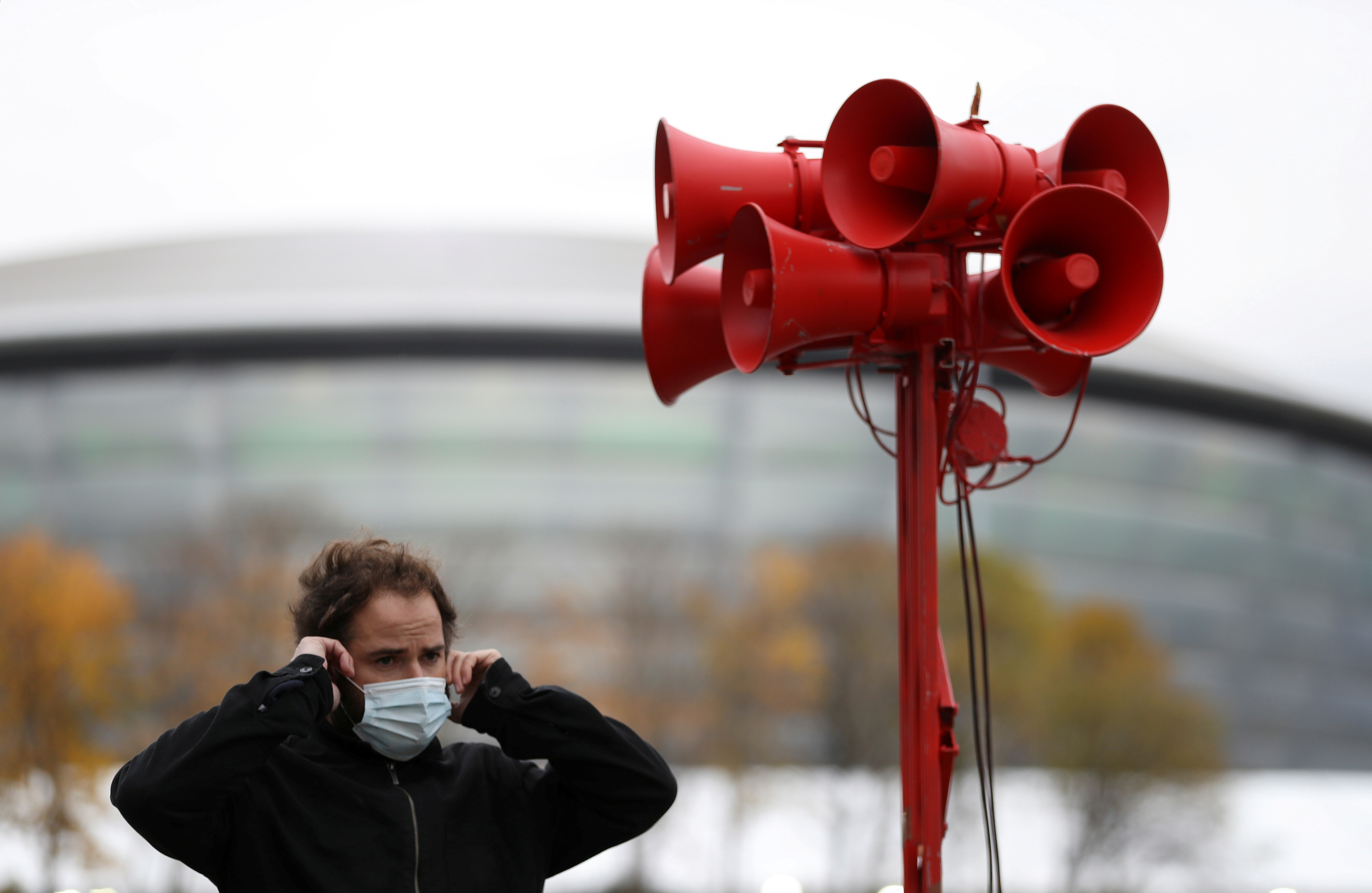 Protesters set off a siren opposite the UN Climate Change Conference (Cop26) venue in Glasgow