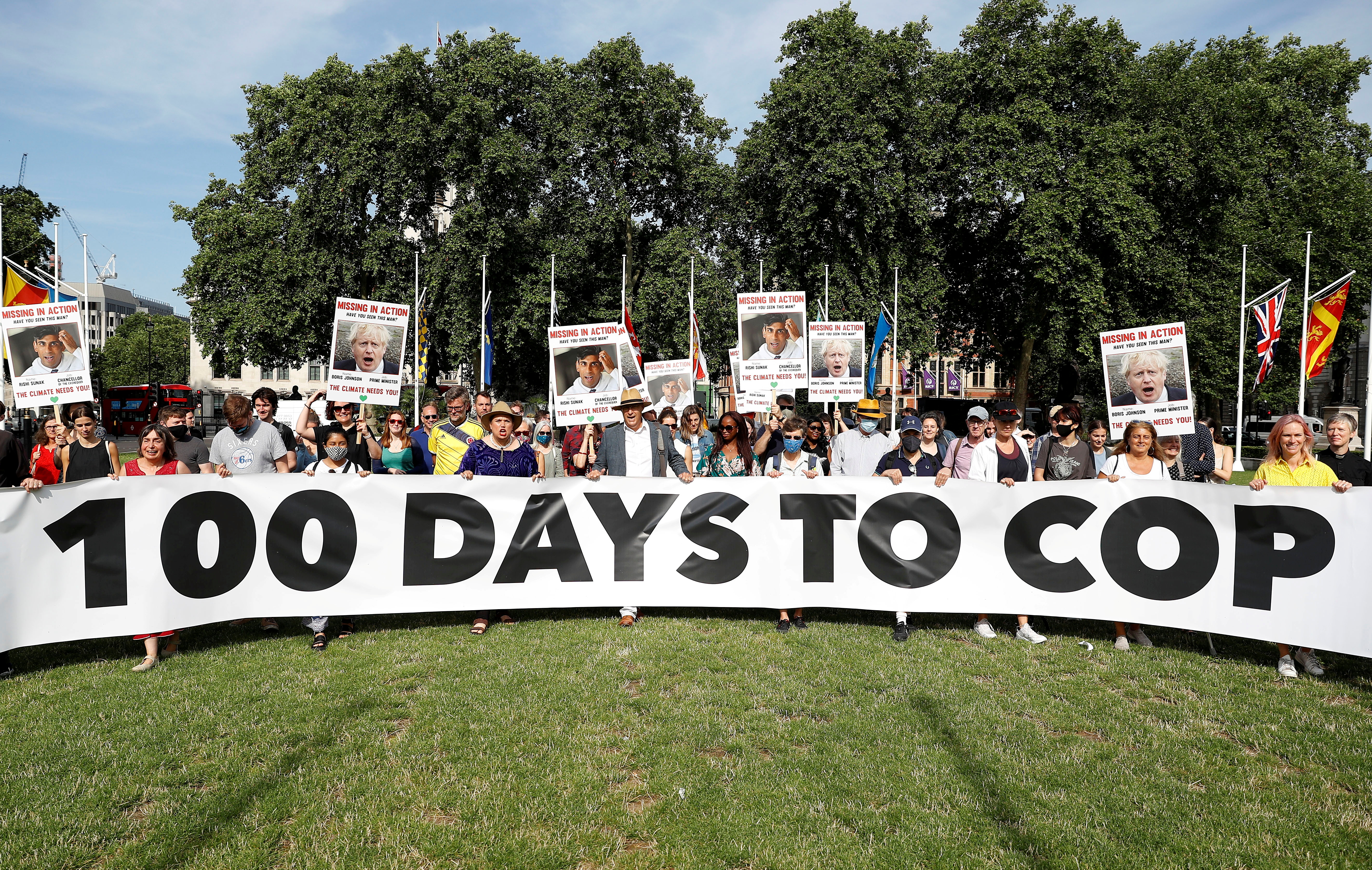 Climate Coalition protesters demonstrate 100 days ahead of the COP26 climate summit, in London