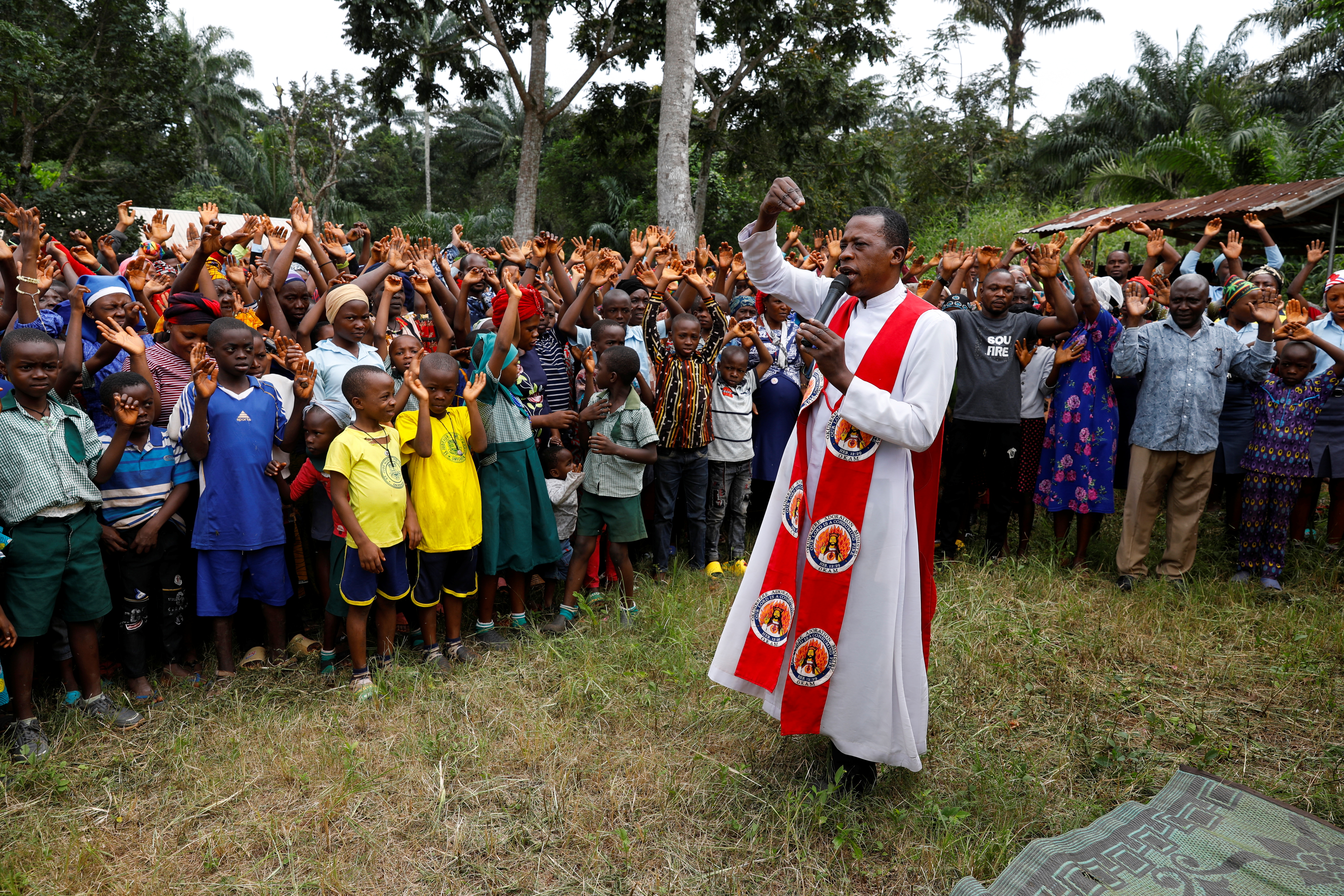 Reverend Father Paul Obayi conducts a mass service for community members in Obollo-Afor, Enugu Nigeria September 29, 2021. Picture taken September 29, 2021. REUTERS/Temilade Adelaja