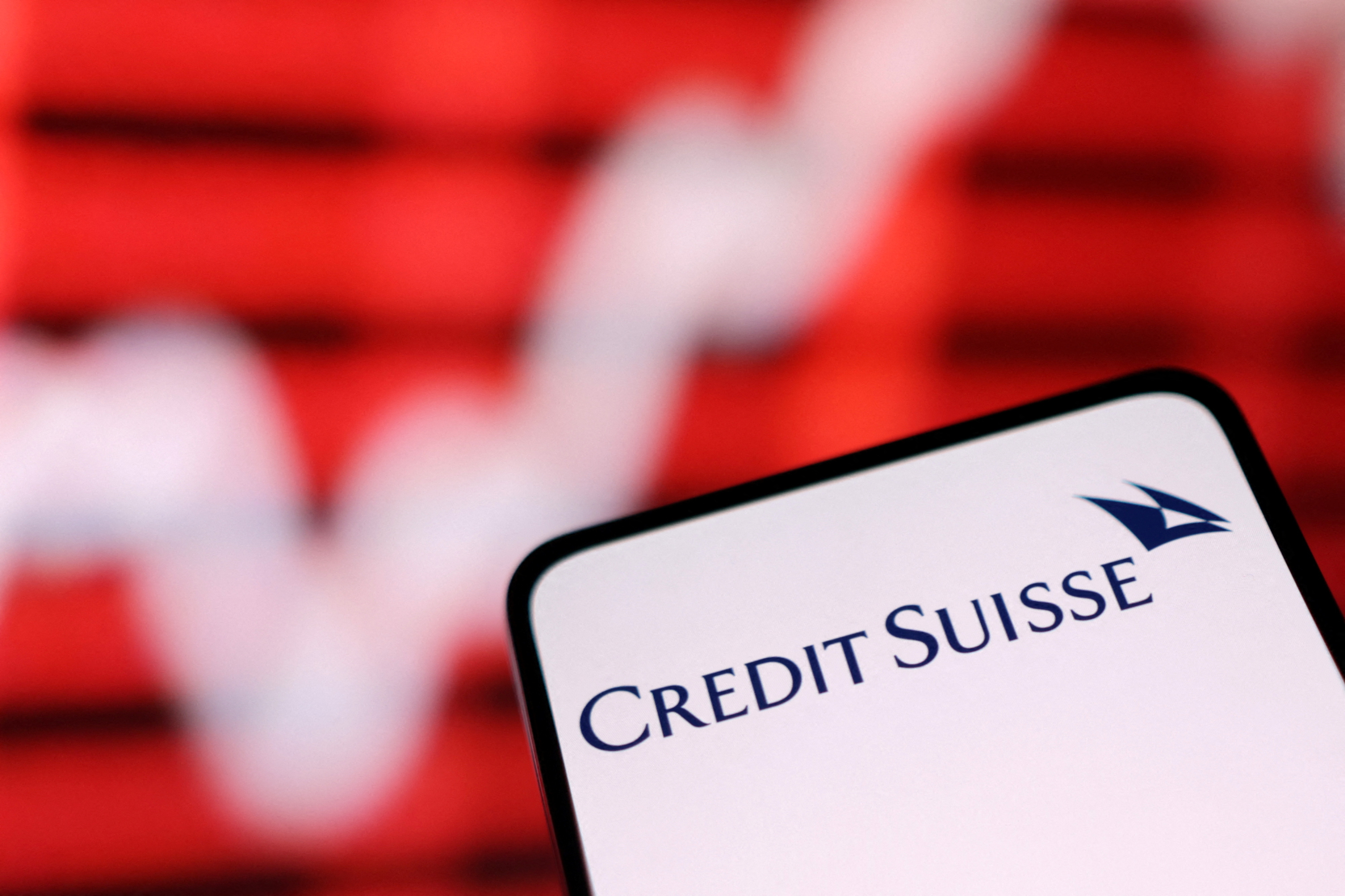 Illustration shows Credit Suisse logo and rising stock graph