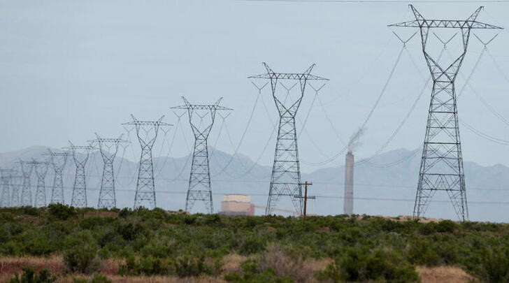 Power lines run from the coal fired Intermountain Power Project, which will close in 2025, outside Delta