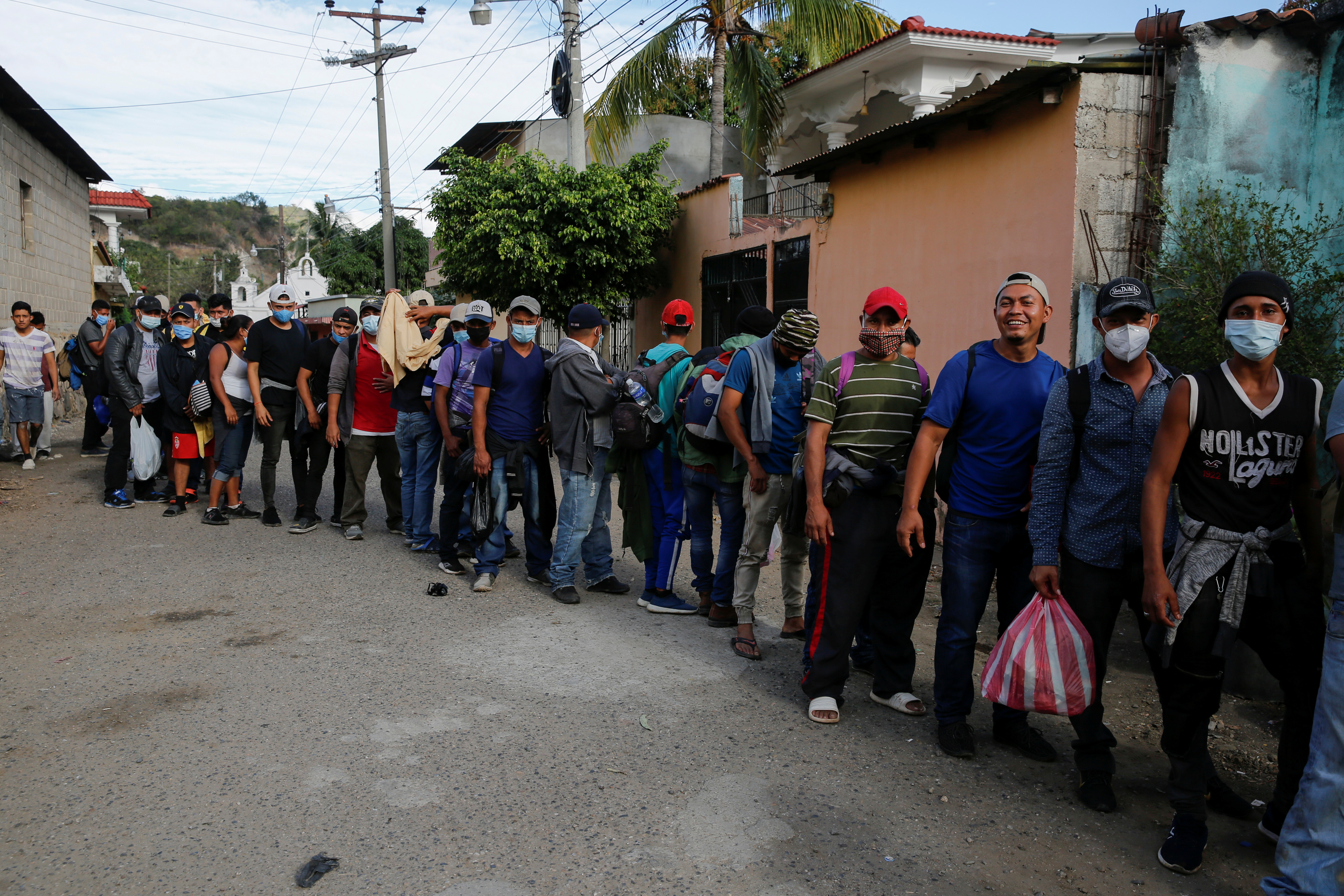 Hondurans take part in a new caravan of migrants set to head to the United States