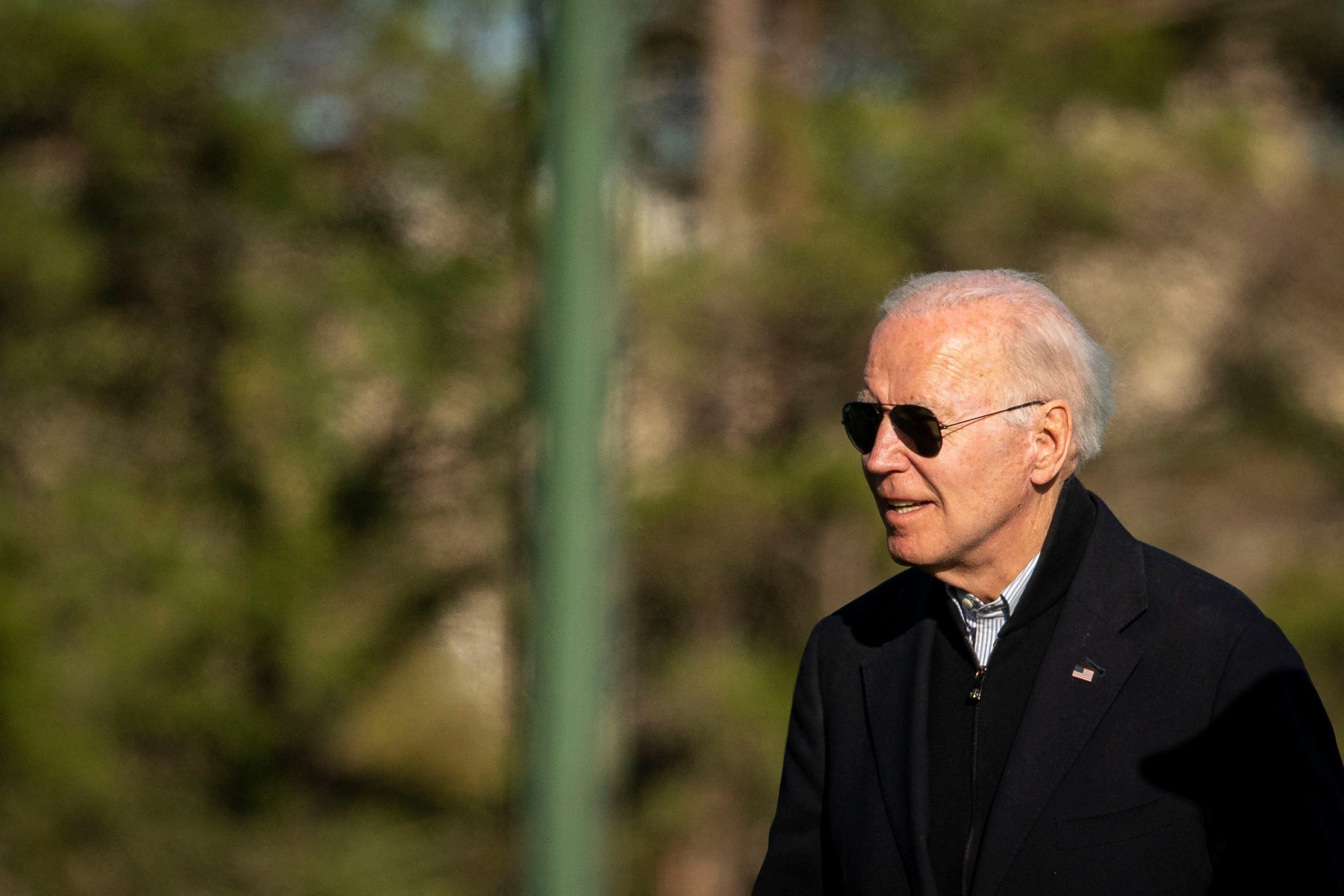 U.S. President Joe Biden walks towards his motorcade at Fort Lesley J. McNair, following spending the weekend at Camp David
