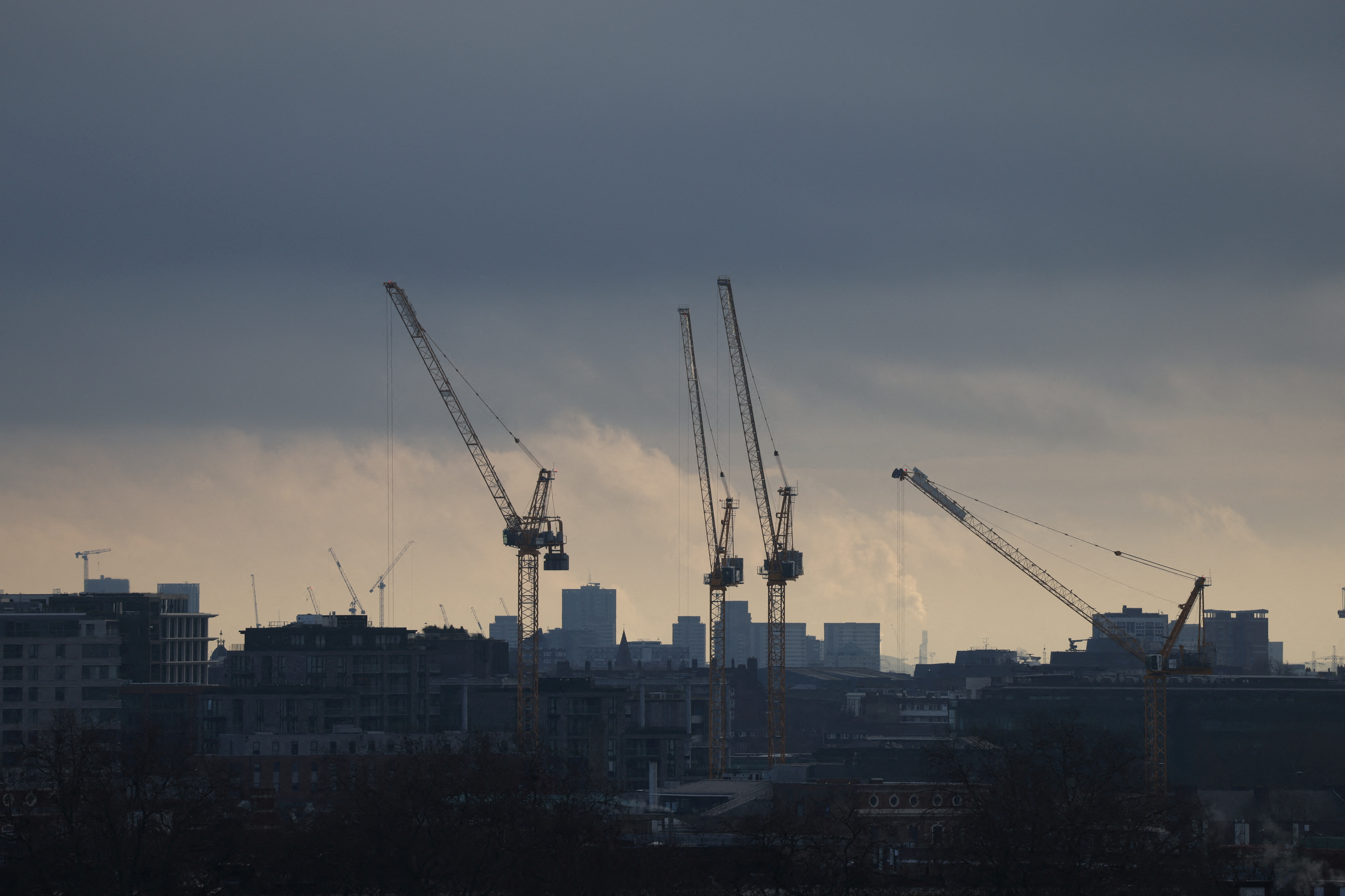 A view of construction cranes in London