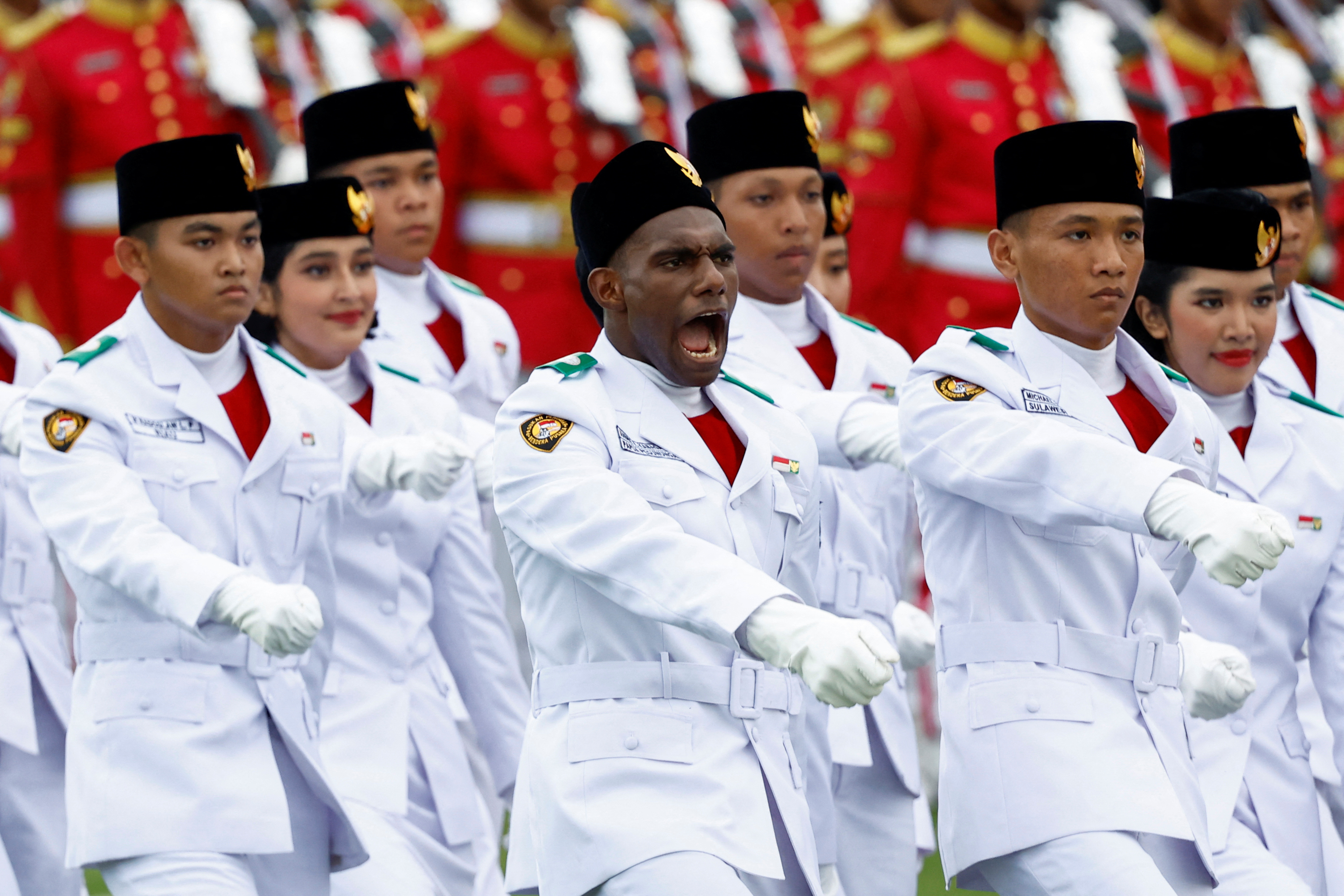 Indonesia holds curtailed Independence Day event in troubled new