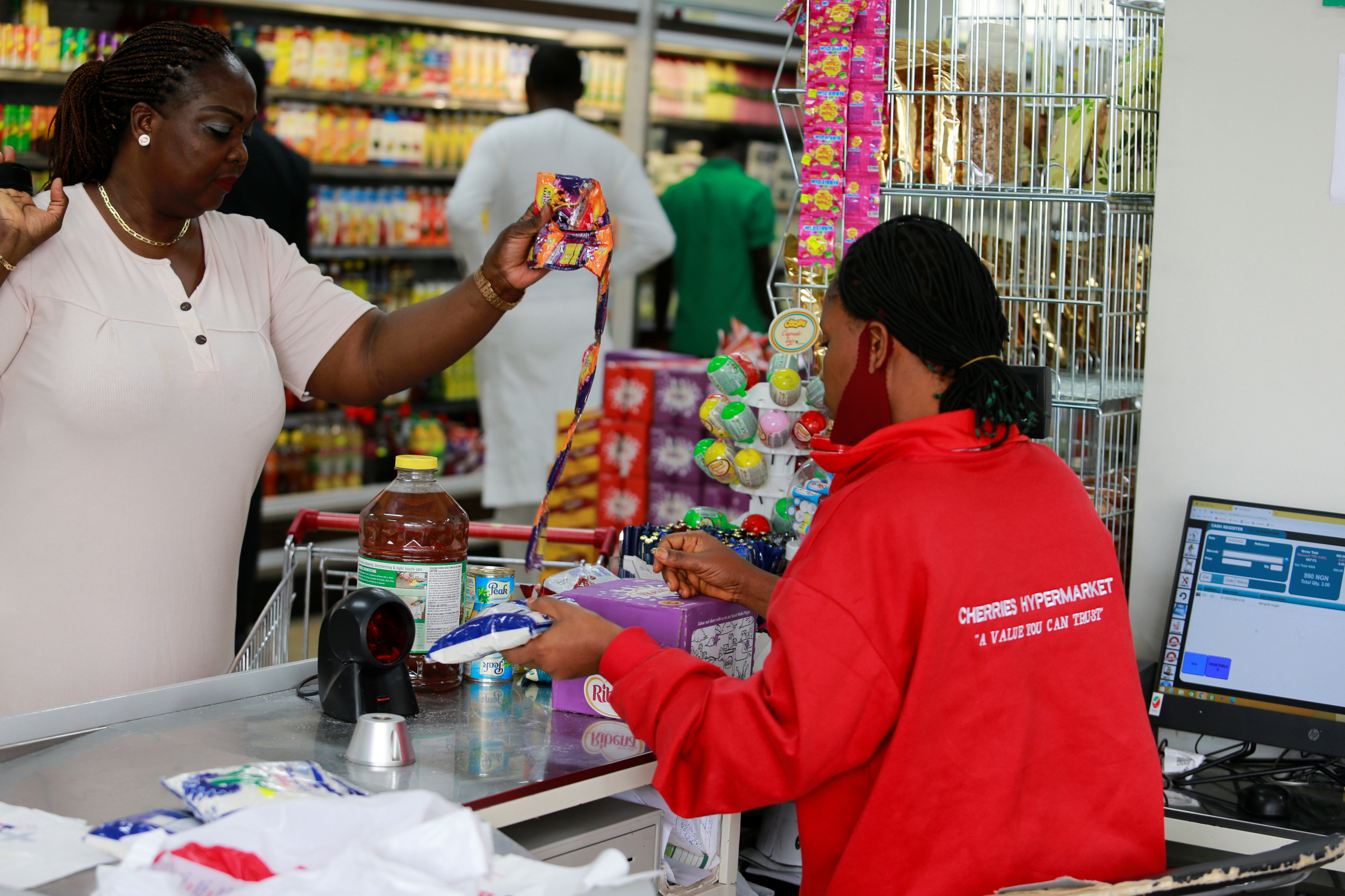 People shop at Cherries Hypermarket in Abuja