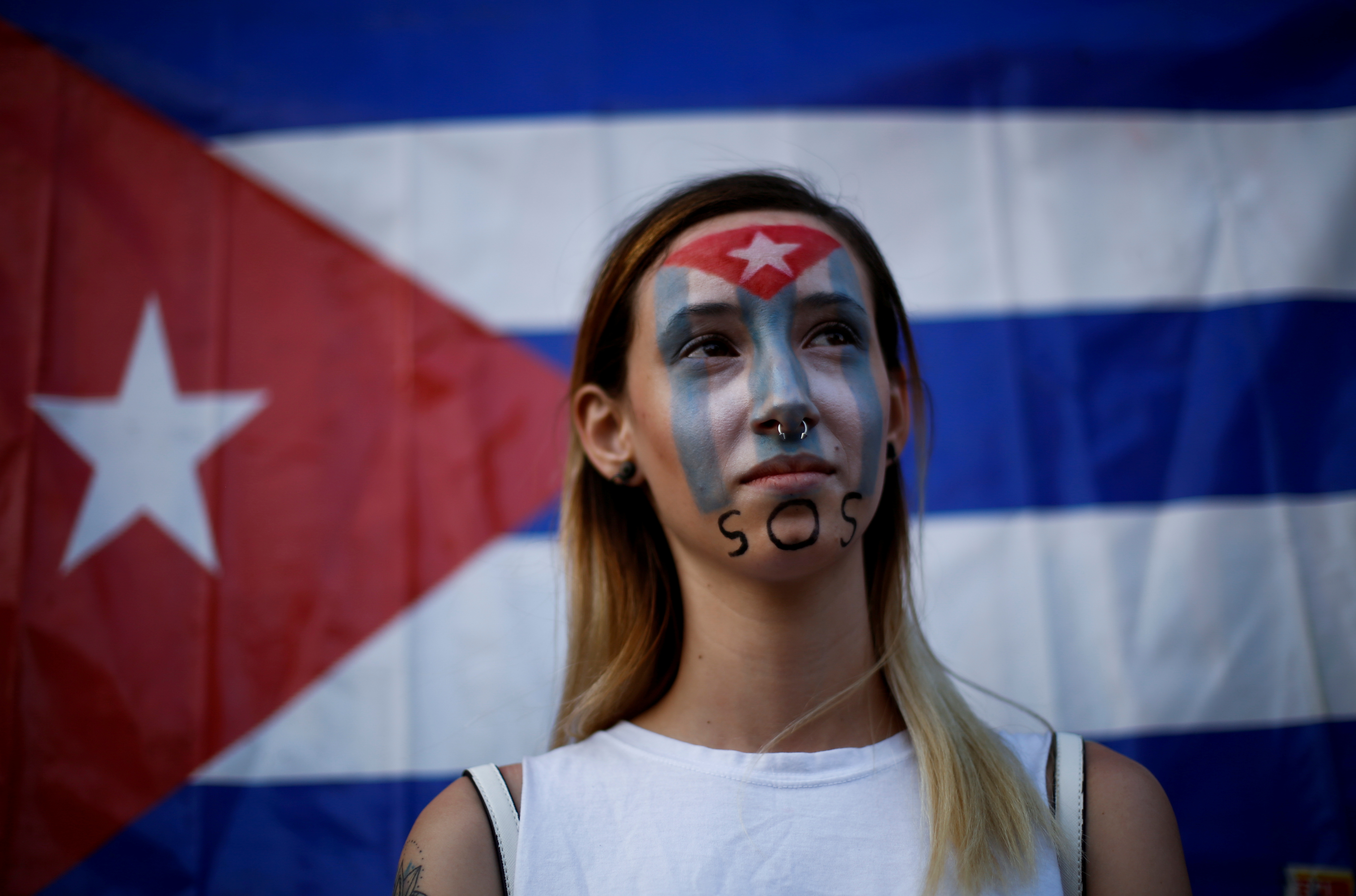 Anilet Ramirez from Cuba takes part in a protest against the Cuban government in front of the offices of the International Organization for Migration (IOM) in Ciudad Juarez, Mexico July 12, 2021. REUTERS/Jose Luis Gonzalez/File Photo