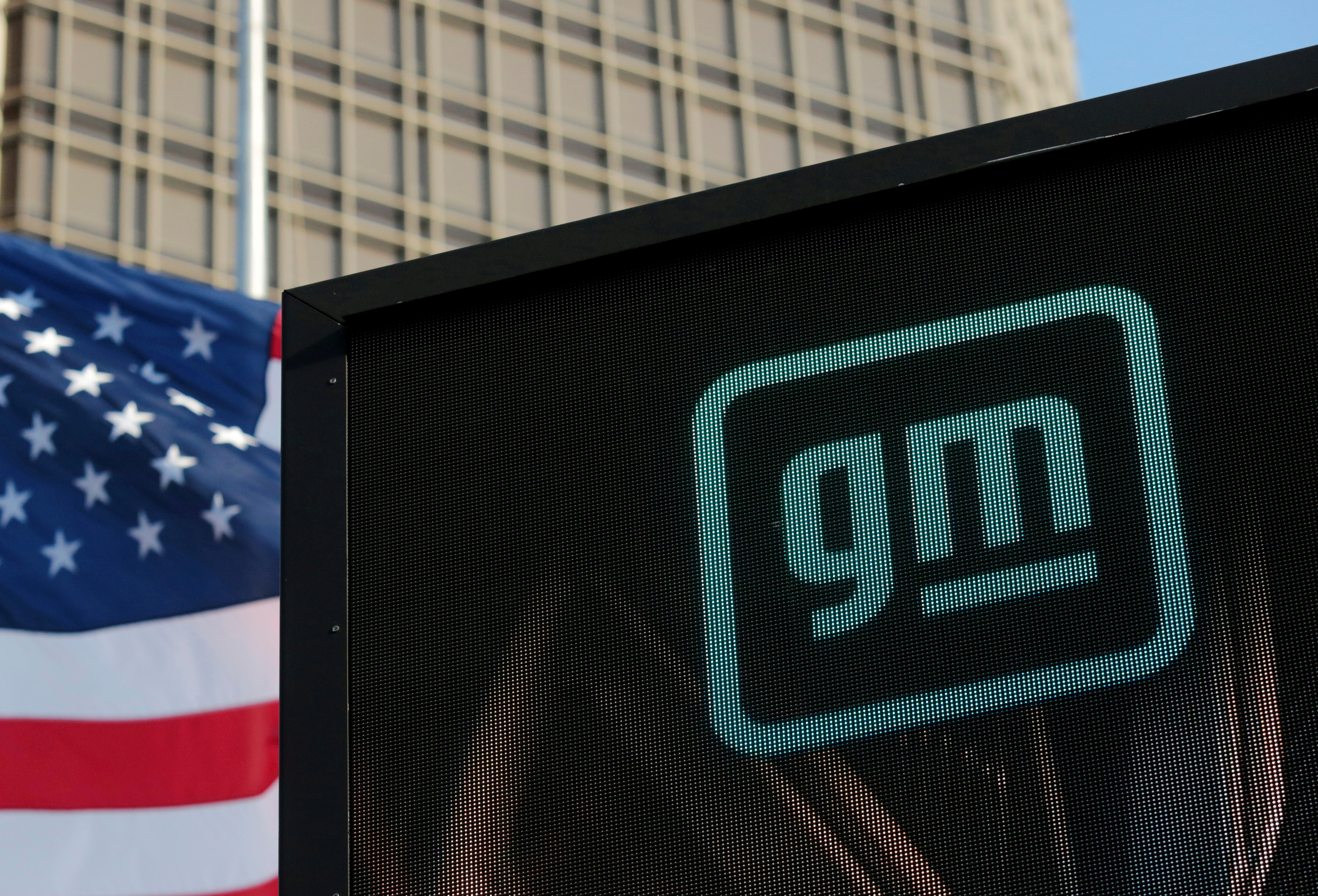 The new GM logo is seen on the facade of the General Motors headquarters in Detroit, Michigan, U.S., March 16, 2021. REUTERS/Rebecca Cook