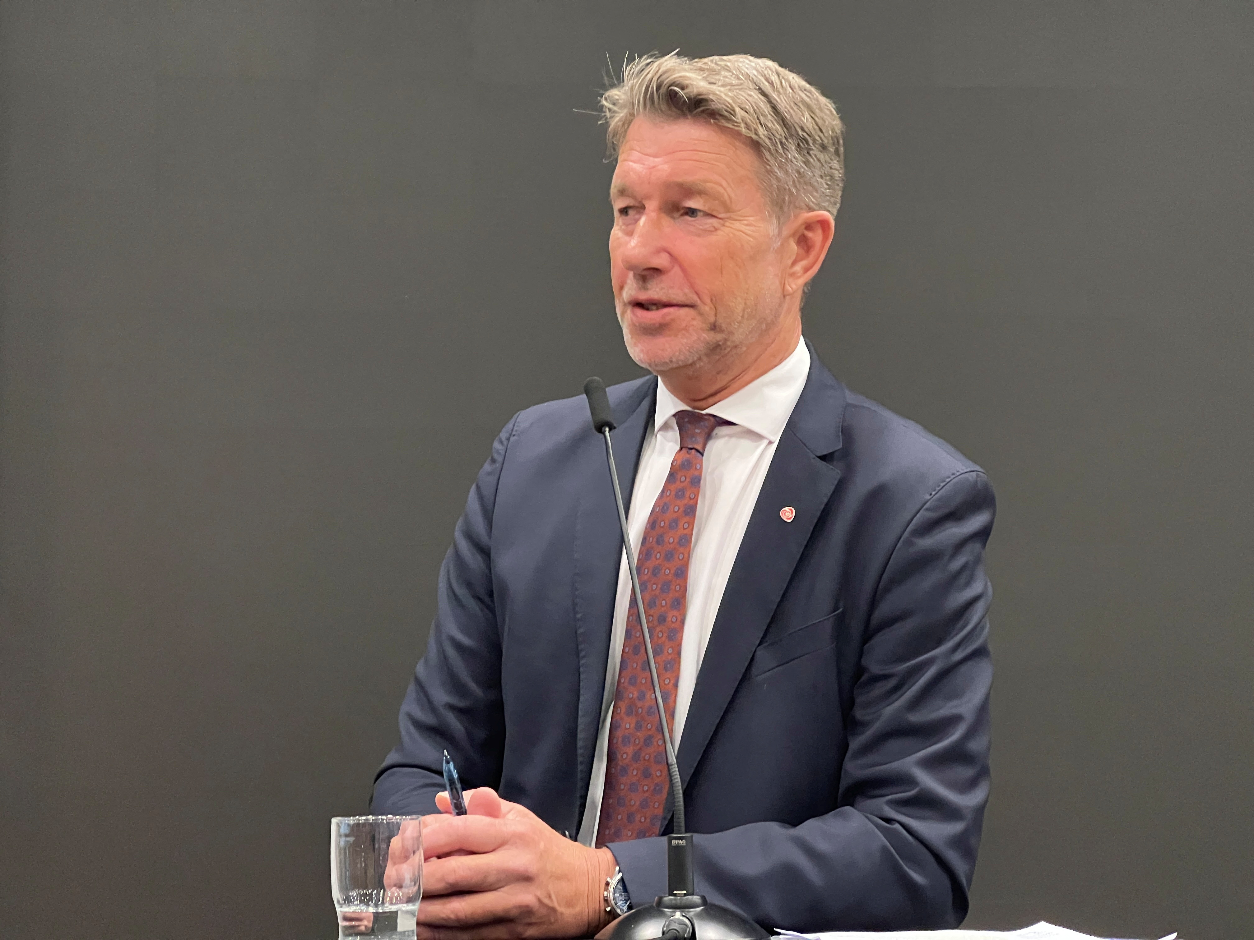Norway's Oil and Energy Minister Terje Aasland talks to members of the media in Oslo