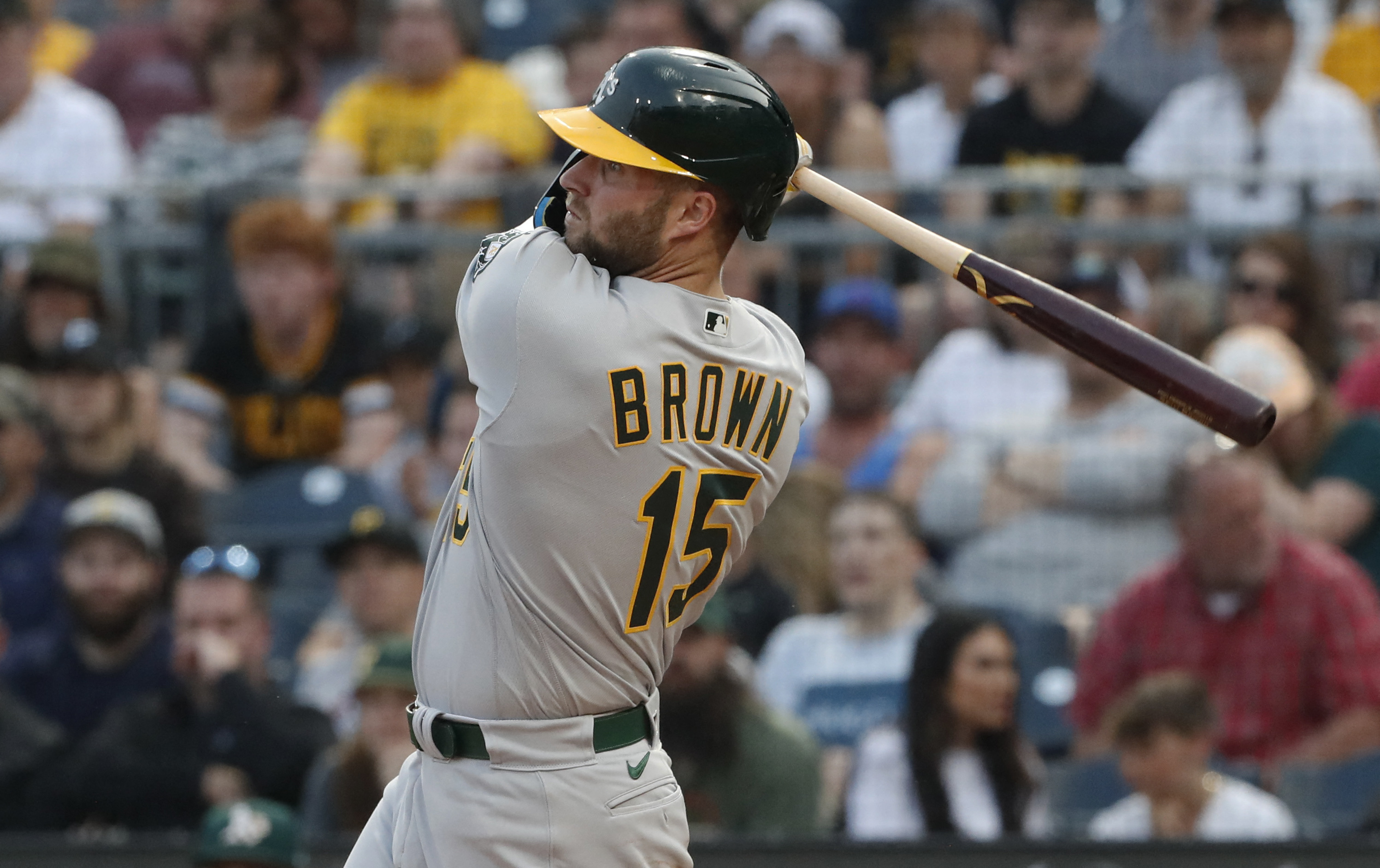 A's sock four homers, batter Pirates to end skid