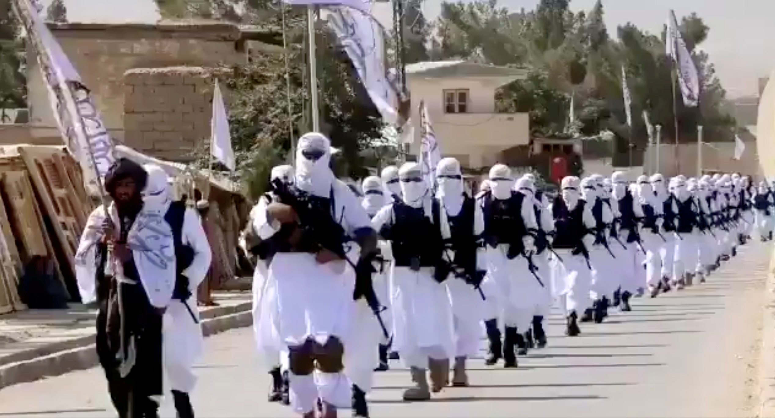 Uniformed Taliban forces parade in Qalat