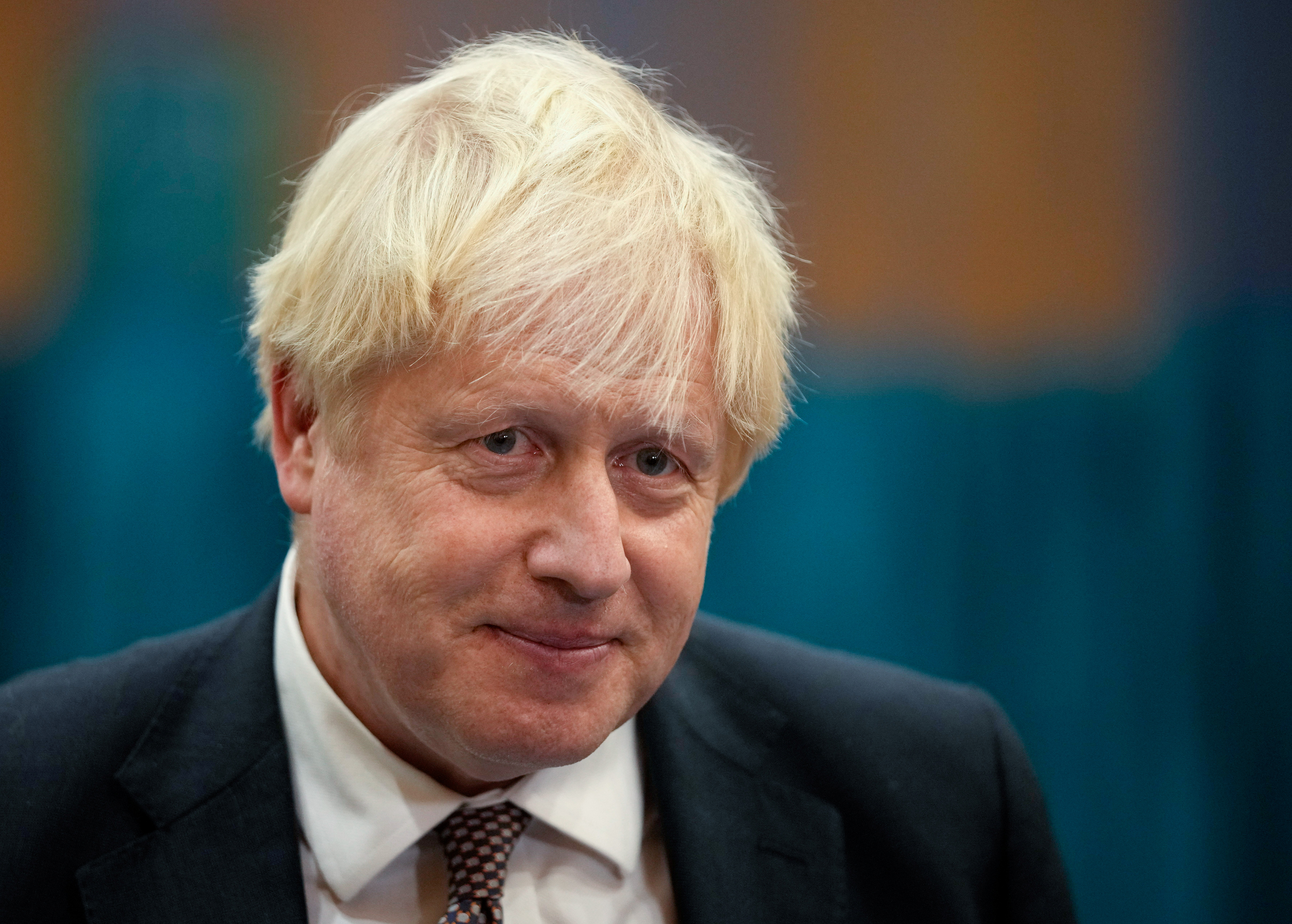 Britain's Prime Minister Boris Johnson speaks to the media as he visits at a COVID-19 vaccination centre at Little Venice Sports Centre, in London, Britain October 22, 2021.  Matt Dunham/Pool via REUTERS