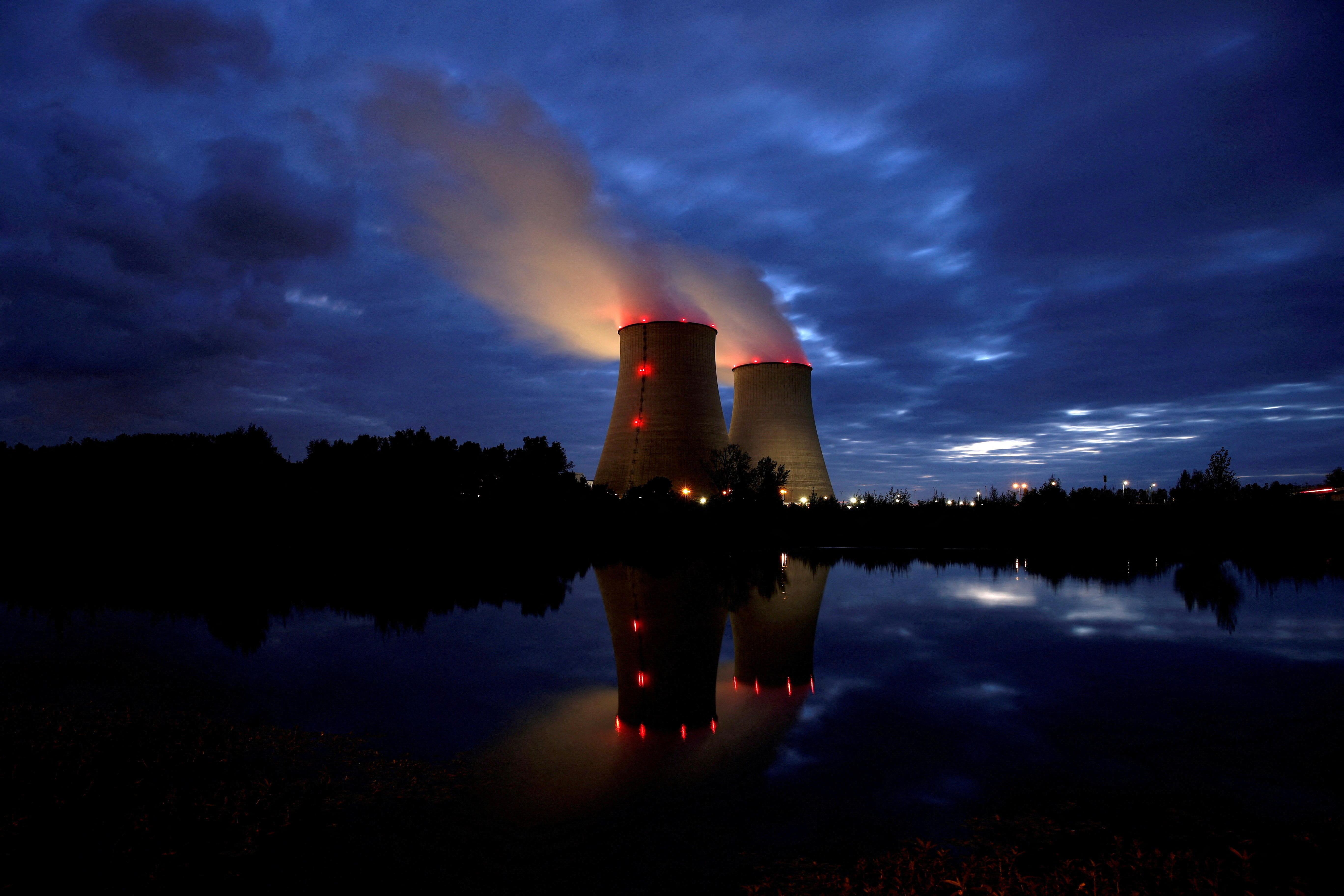 Steam rises from cooling towers of the Electricite de France (EDF) nuclear power station in Belleville-sur-Loire