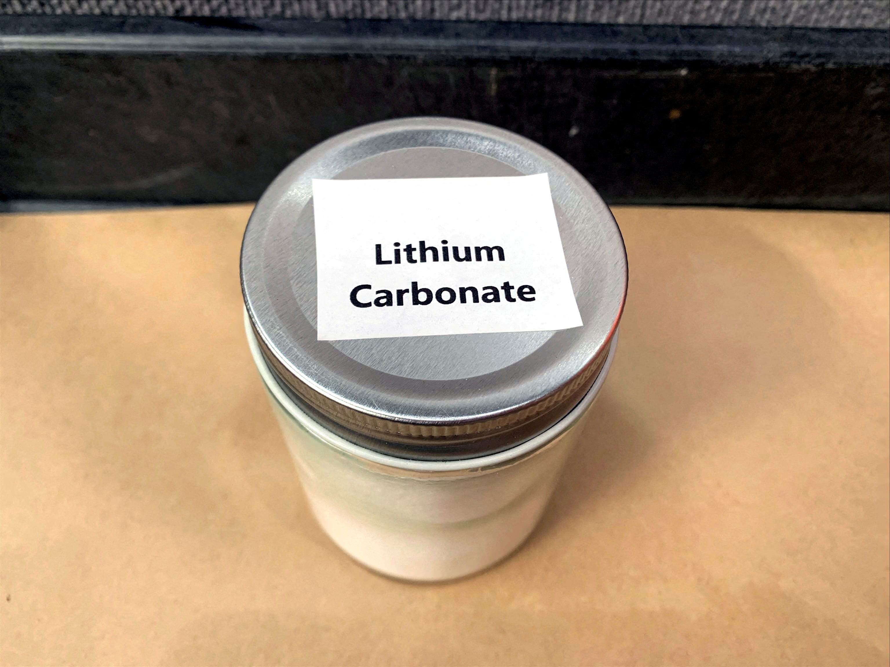 Jar of lithium carbonate produced by Rio Tinto from its Jadar lithium project in Serbia is displayed in Melbourne