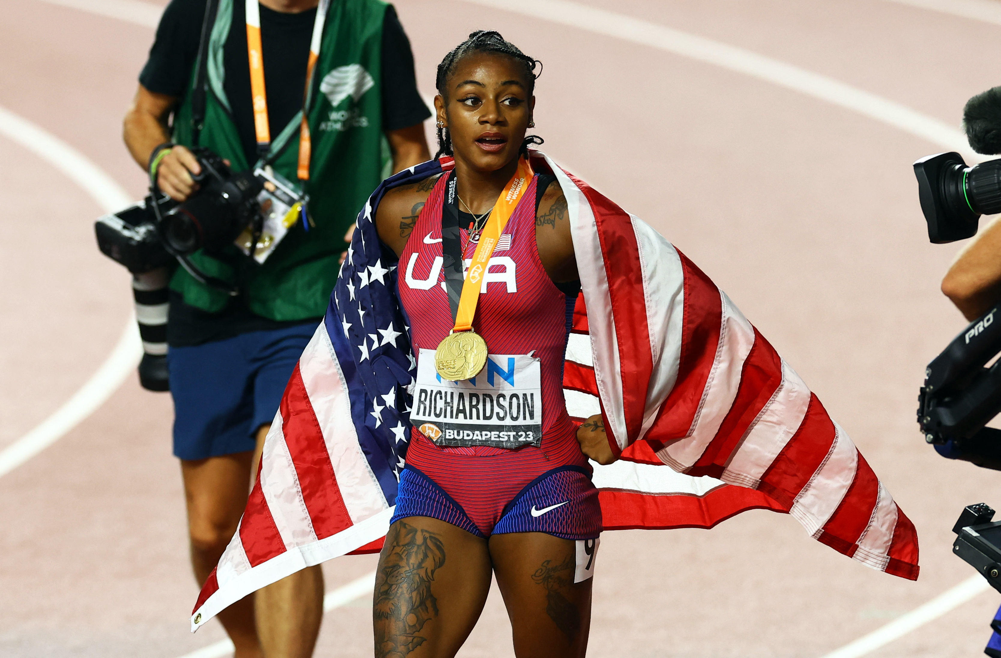 American Richardson claims world gold in women's 100m