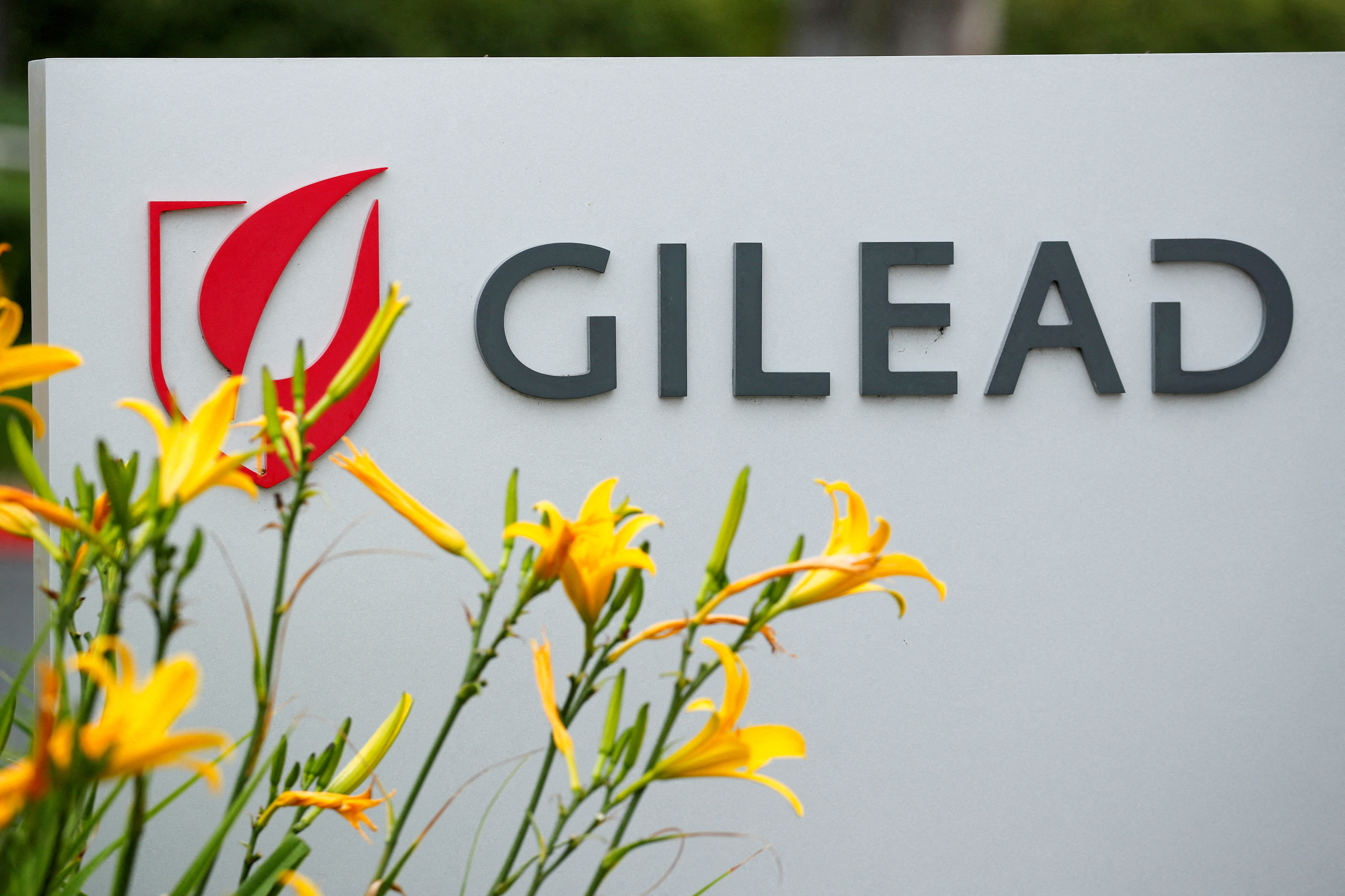 The logo of Gilead Sciences Inc pharmaceutical company is seen in Oceanside, California