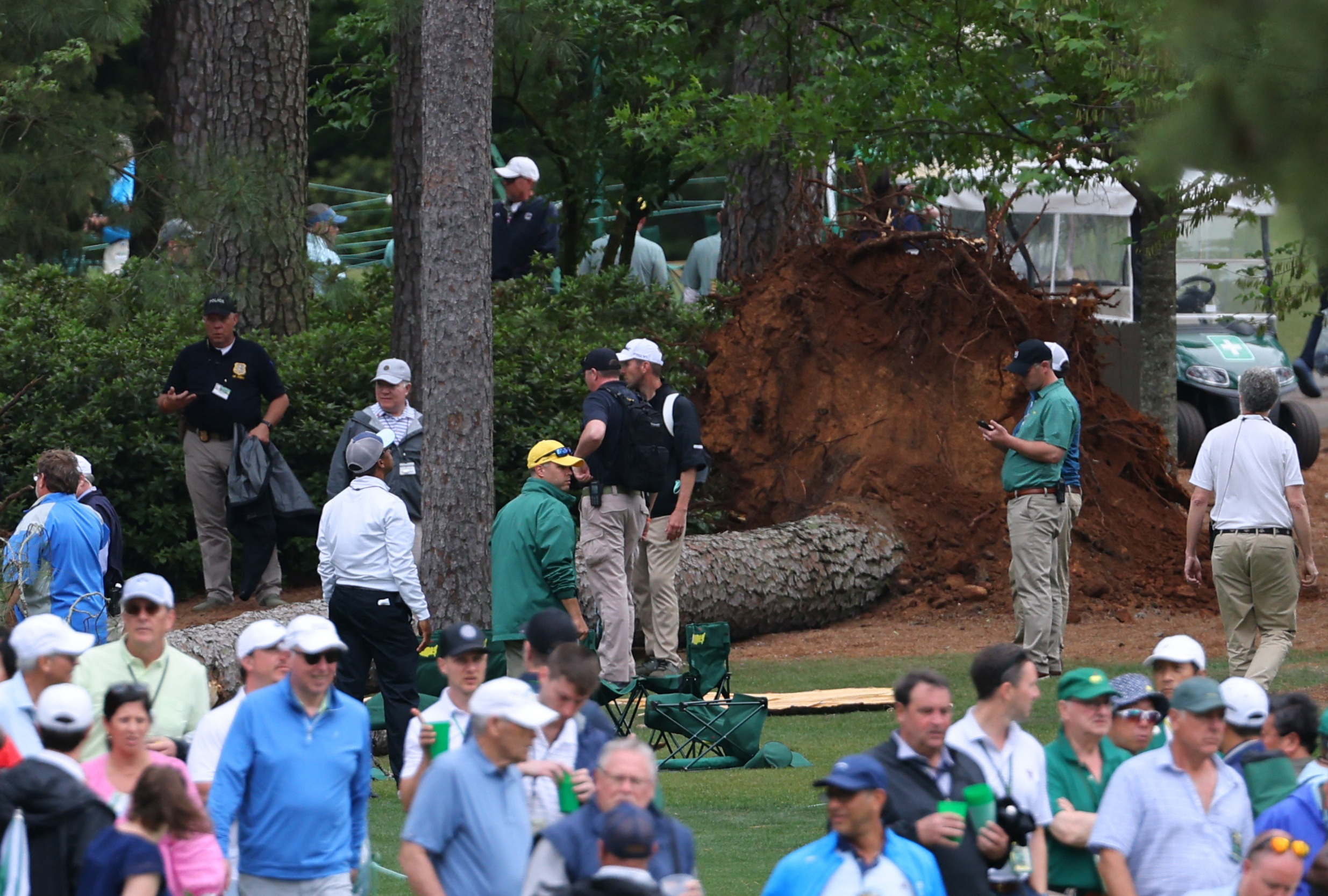 Masters second round suspended for day after strong storms down trees