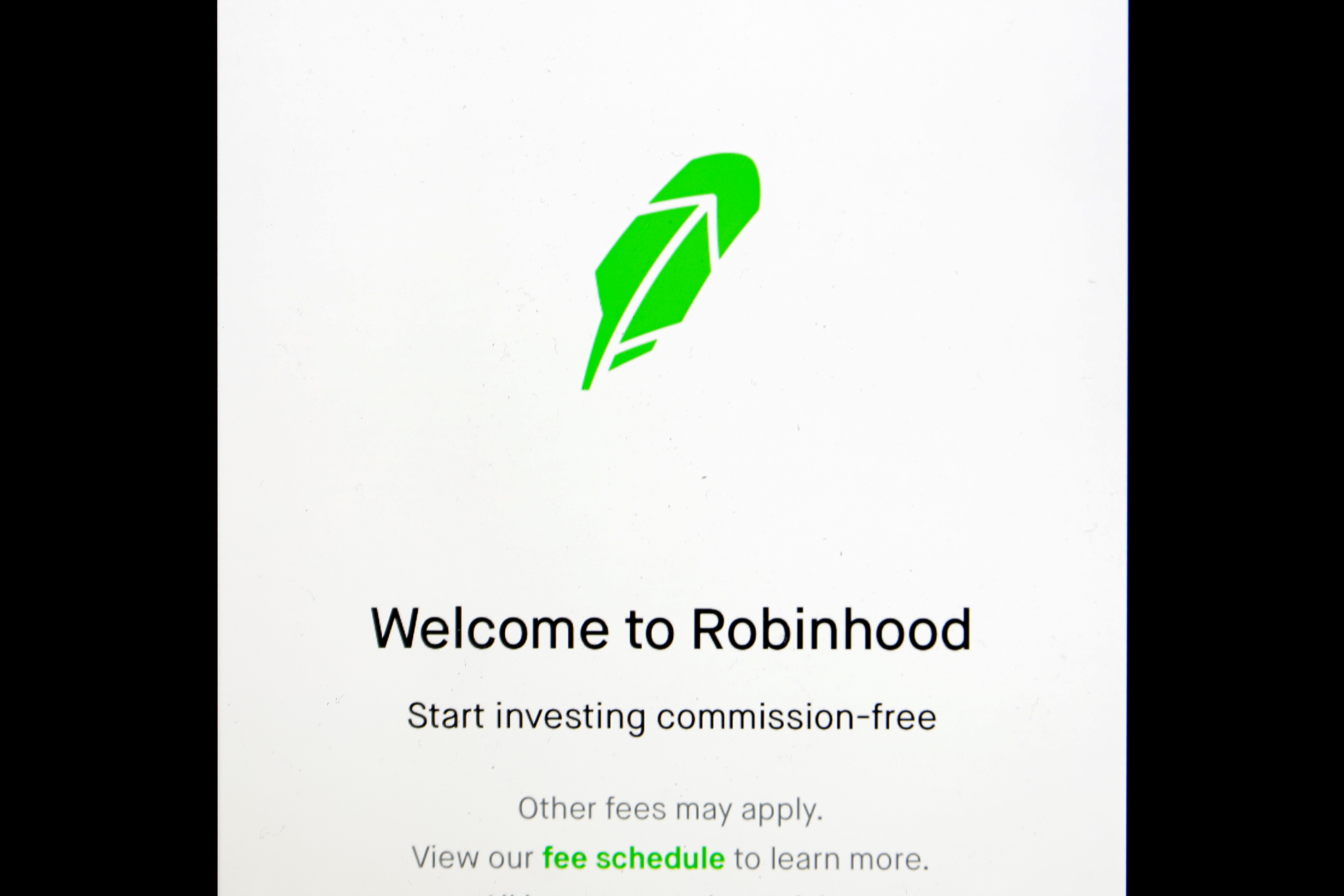 The welcome screen for the Robinhood App is displayed on a screen in this photo illustration January 29, 2021. REUTERS/Brendan McDermid/Illustration