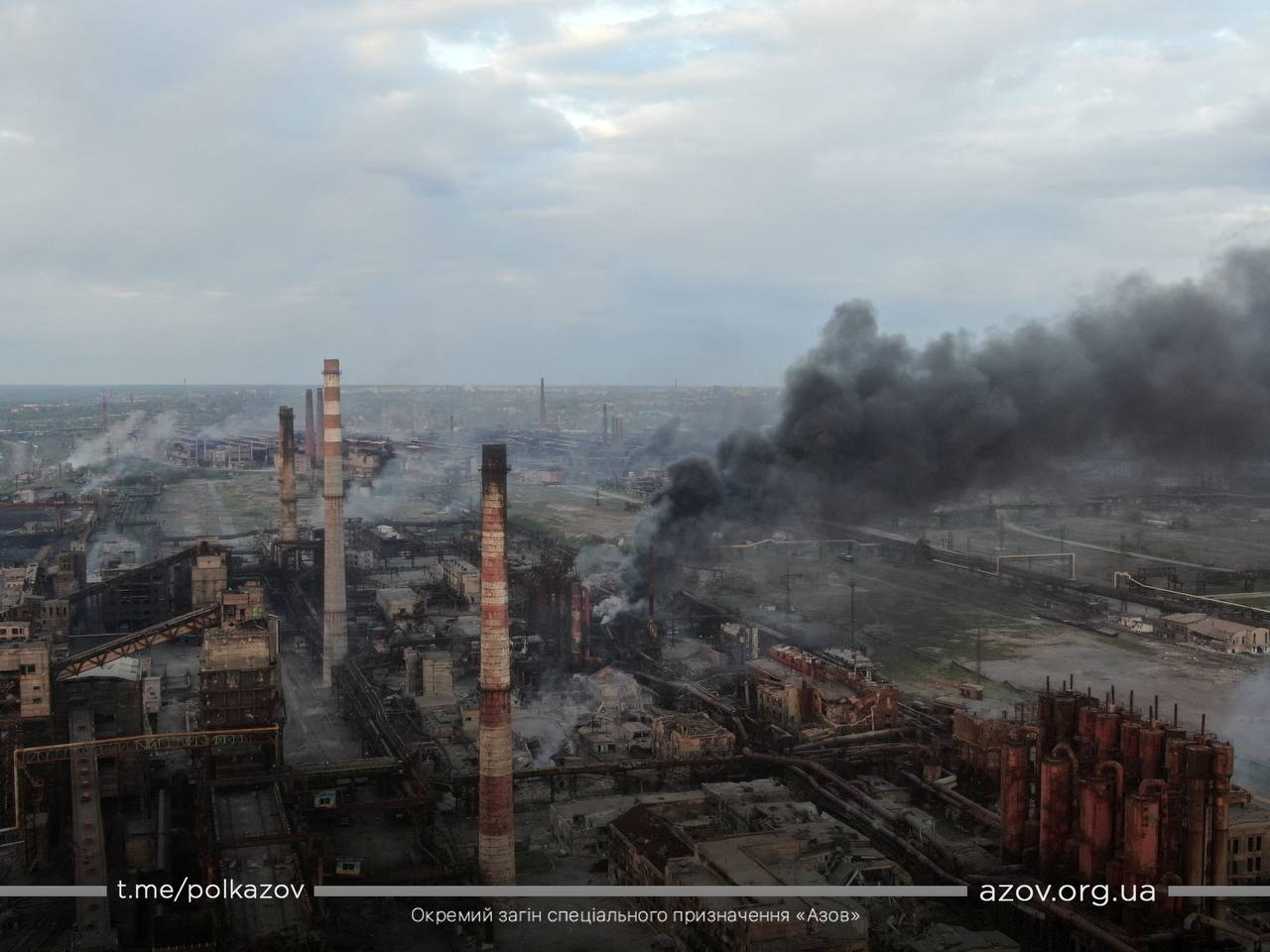 A view shows smoke rising at Azovstal Iron and Steel Works in Mariupol