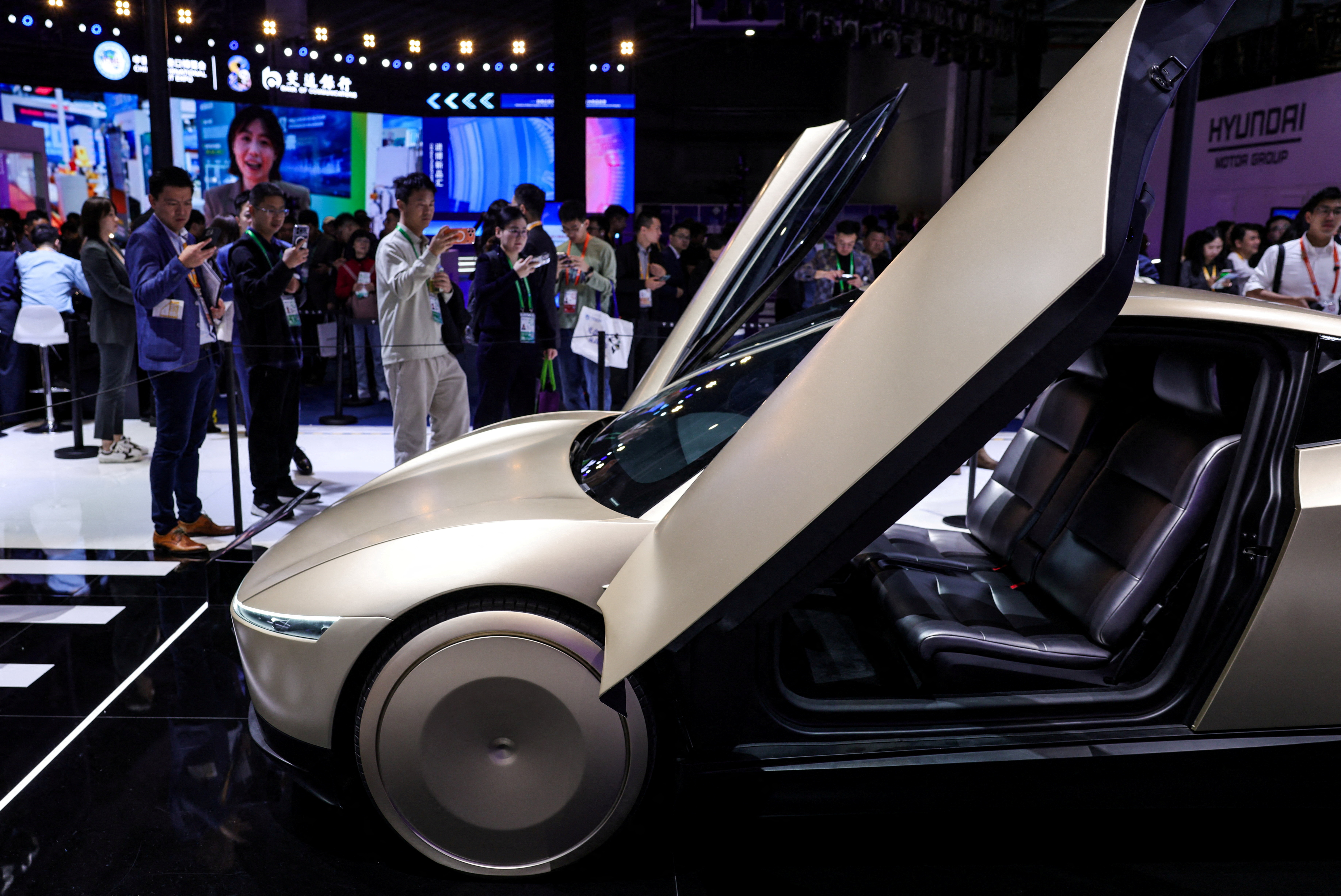 Tesla plans $20 billion capital spending spree in push beyond human-driven cars | Reuters