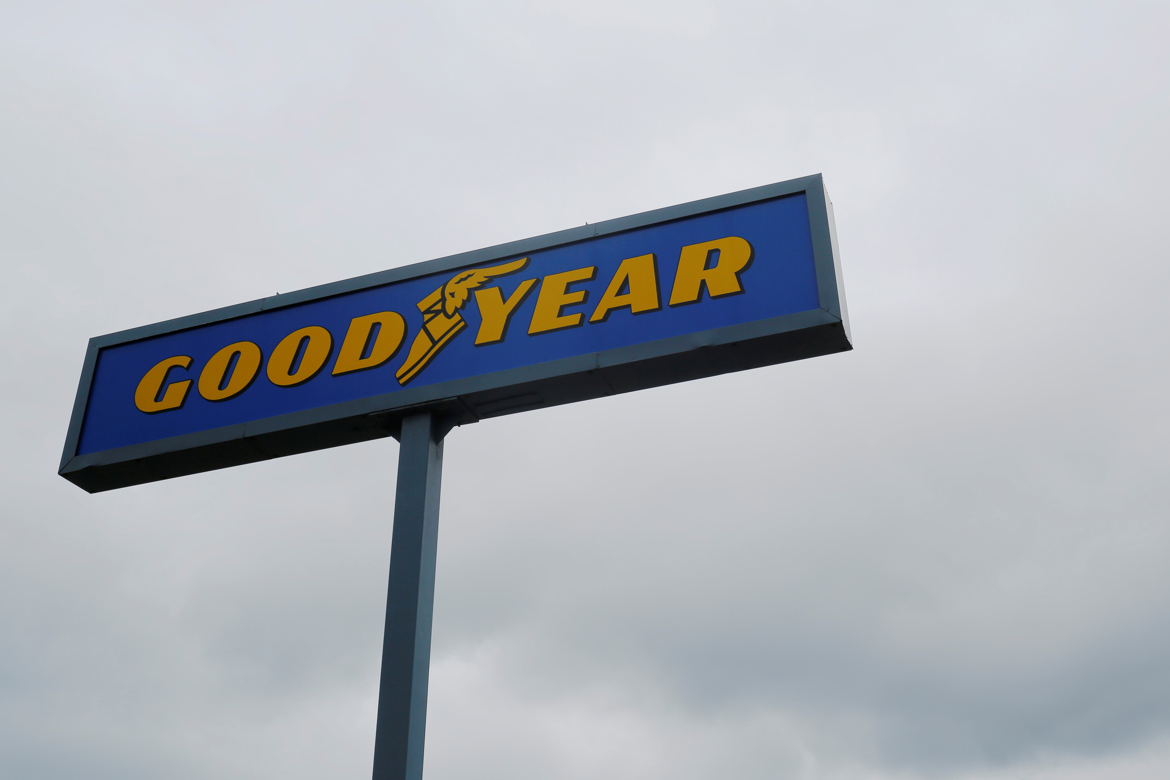 A sign stands over a Goodyear Tire facility in Somerville