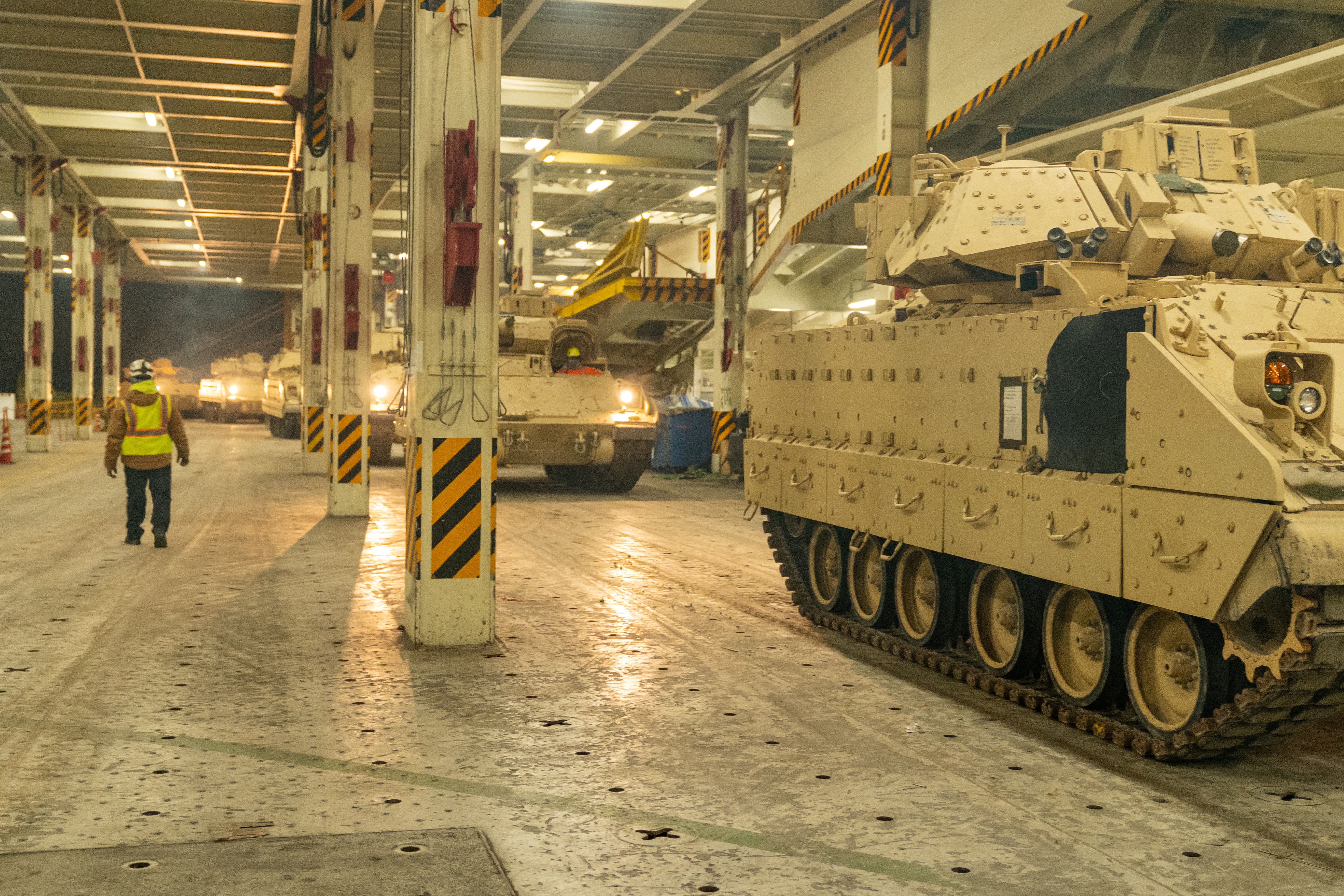 Ukraine-bound Bradley Fighting Vehicles load onto ship in South Carolina