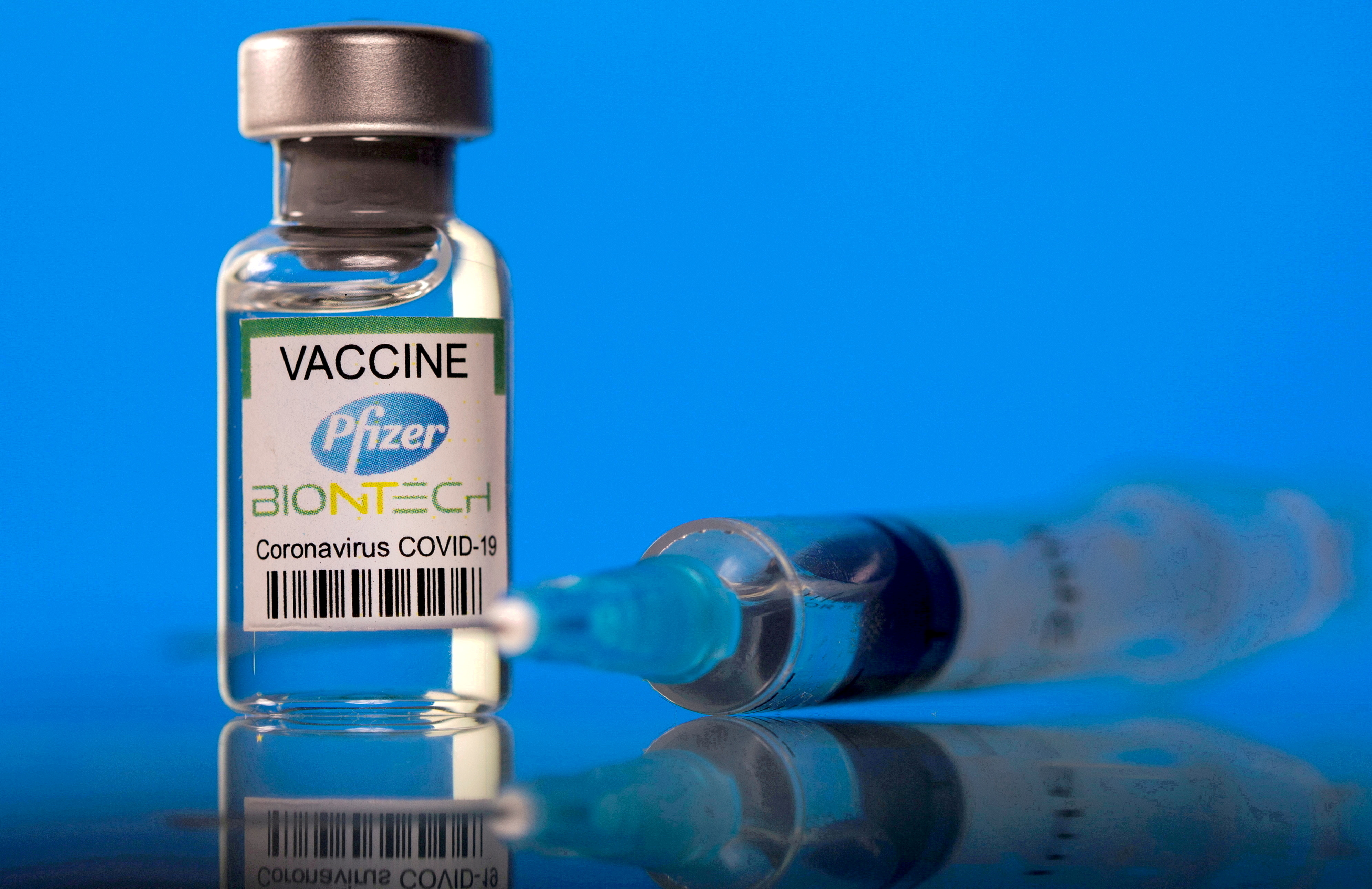 Picture illustration of a vial labelled with the Pfizer-BioNTech coronavirus disease (COVID-19) vaccine