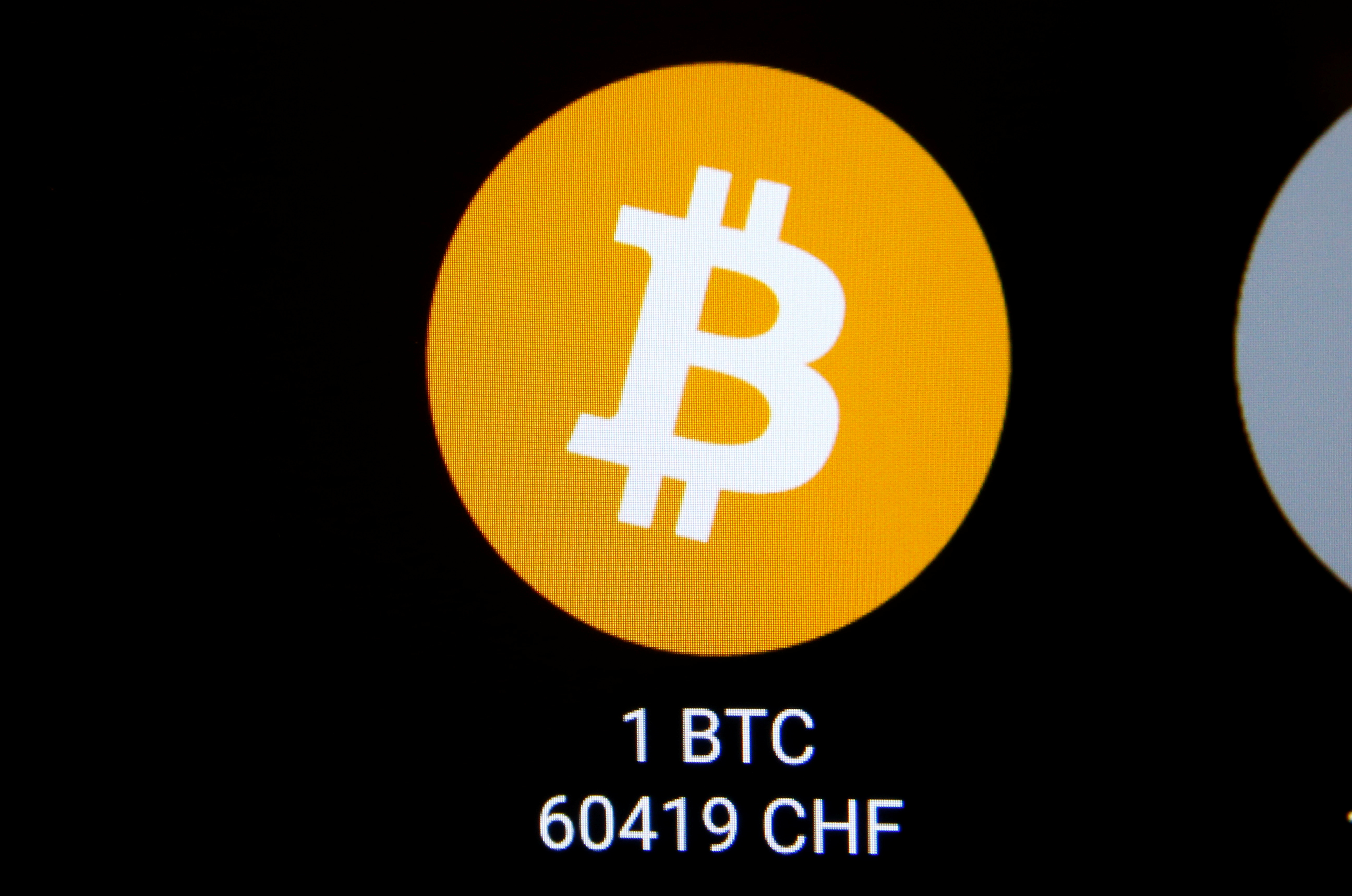 The logo and the exchange rate of Bitcoin (BTH) to Swiss franc (CHF) is seen on the display of a cryptocurrency ATM of blockchain payment service provider Bity at the House of Satoshi bitcoin and blockchain shop in Zurich, Switzerland November 4, 2021. REUTERS/Arnd Wiegmann