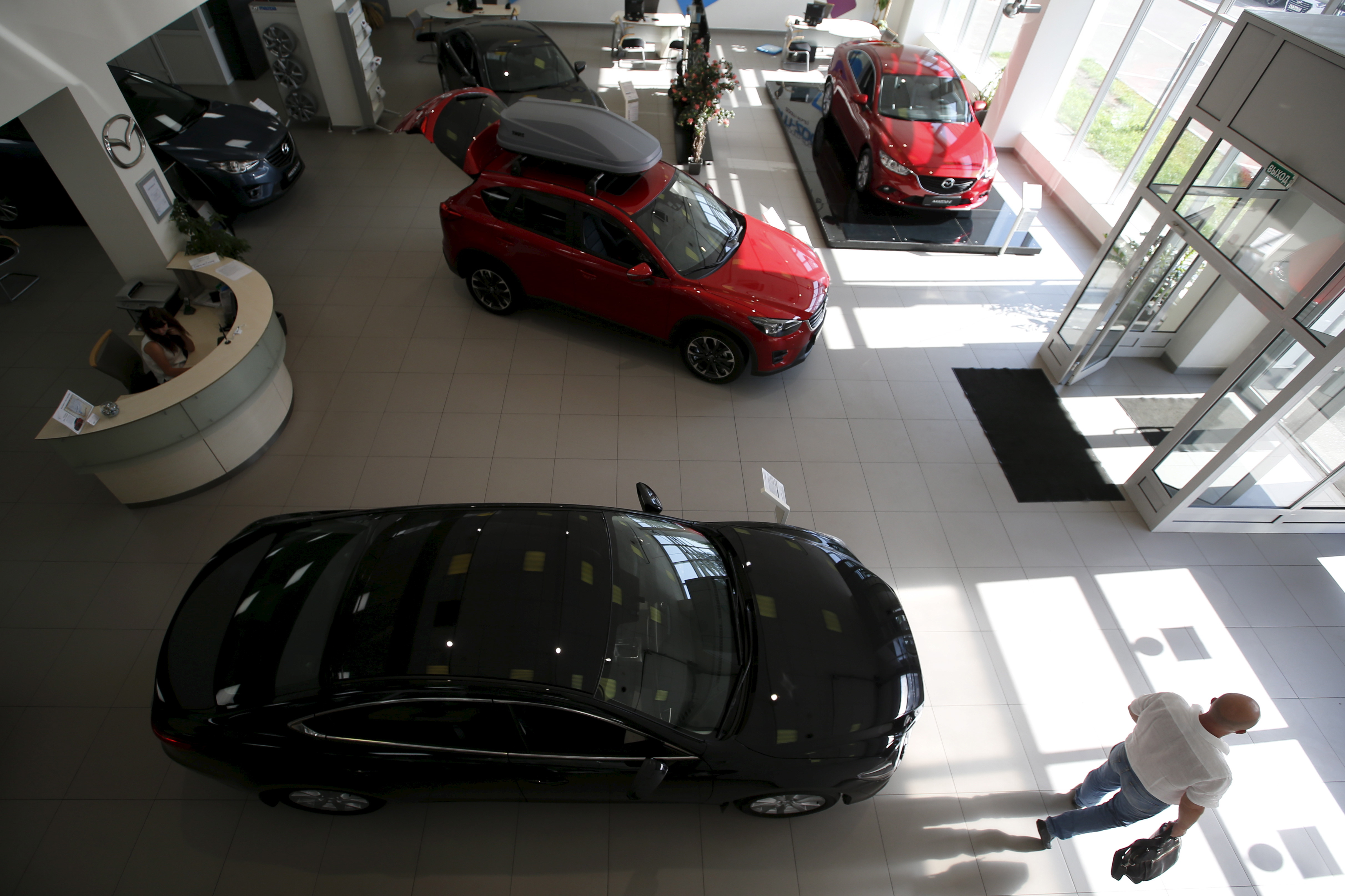 Mazda 6 and CX 5 models are on sale at showroom of Avtomir company in Moscow