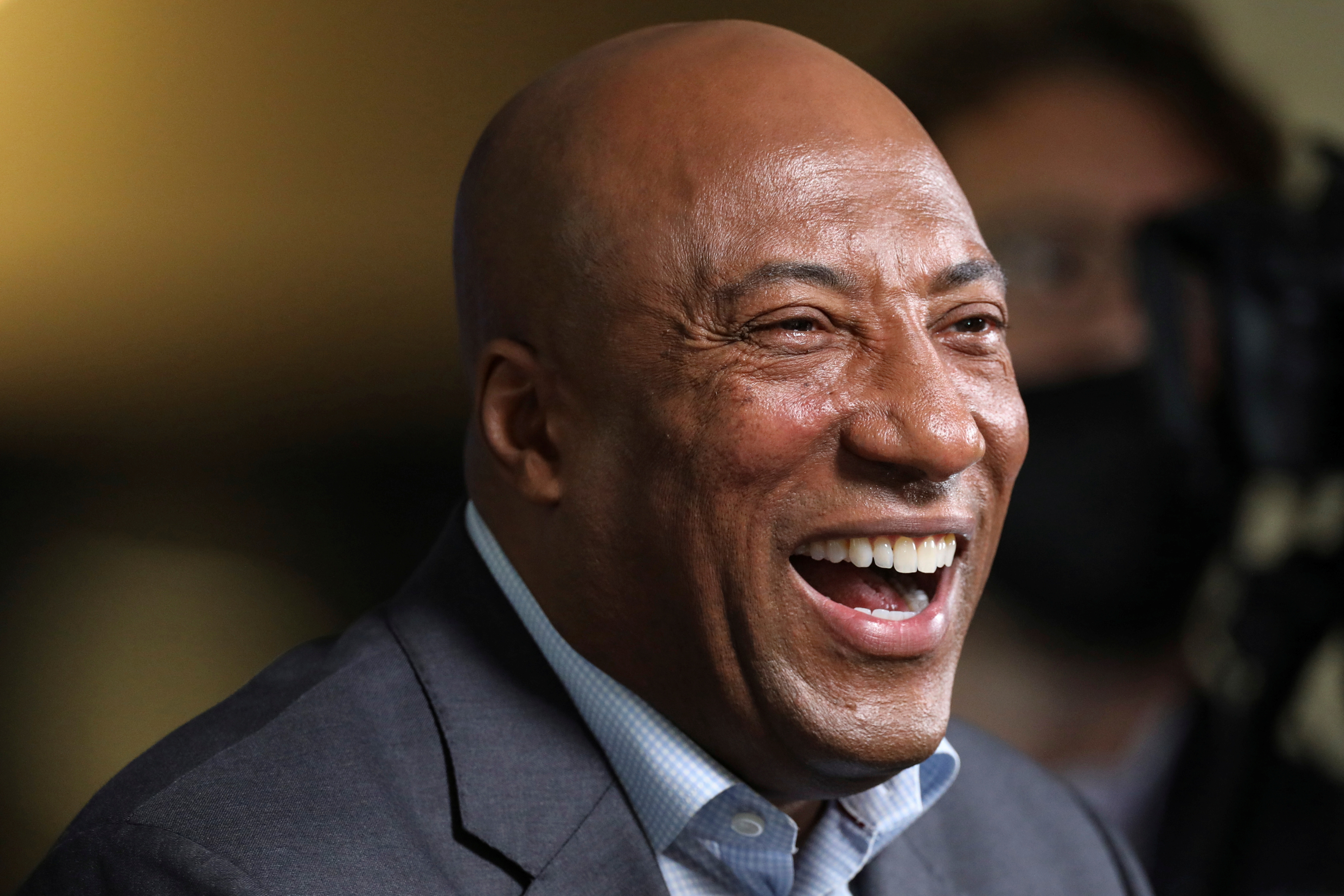 Byron Allen, Founder, Chairman and CEO of Entertainment Studios and Allen Media Group, reacts at the 2021 Milken Institute Global Conference in Beverly Hills, California, U.S., October 19, 2021. REUTERS/David Swanson