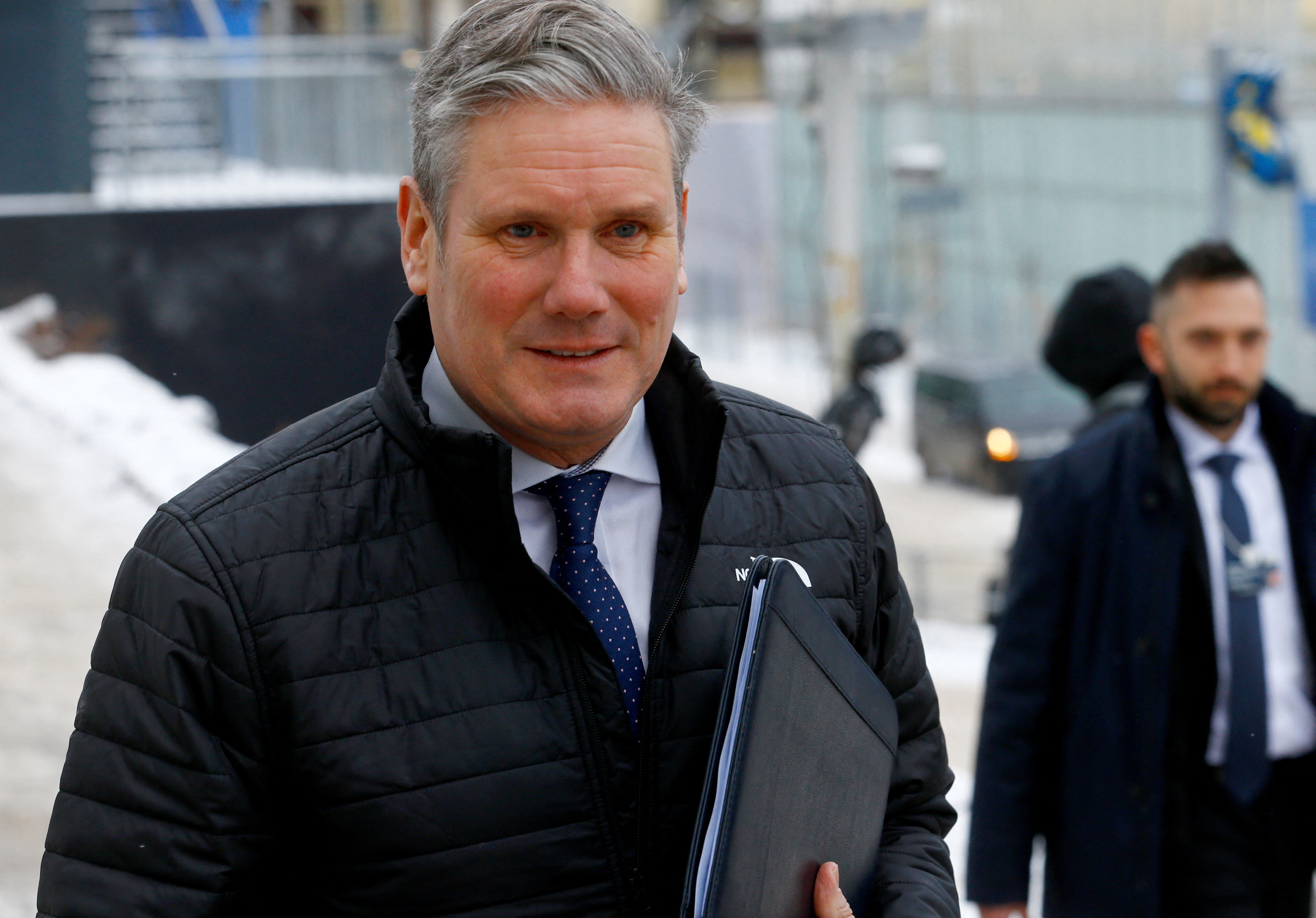 Britain's Labour leader Starmer walks to a meeting during the World Economic Forum in Davos