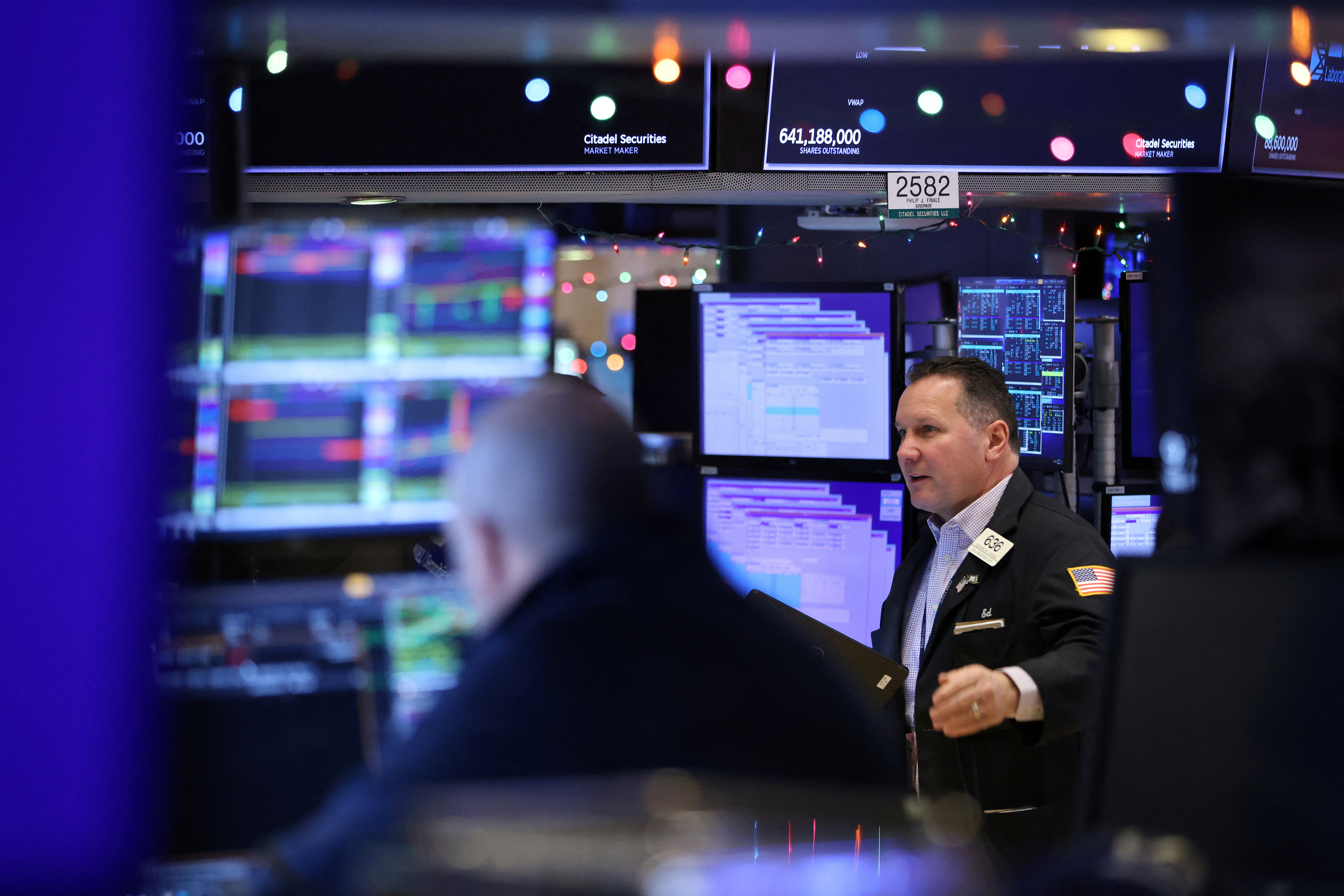 A trader works on the floor of the New York Stock Exchange (NYSE) in New York