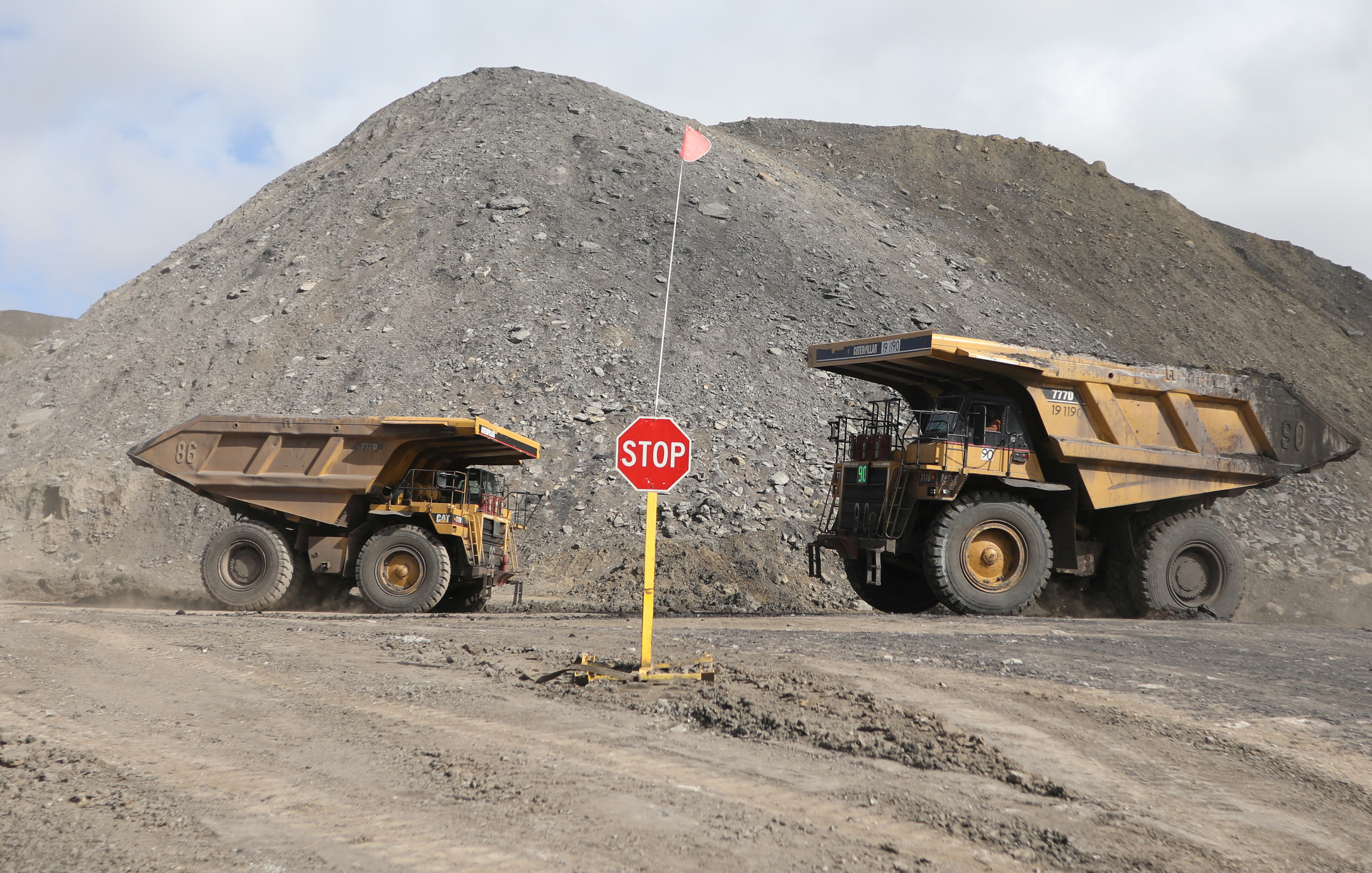 Dump trucks haul coal and sediment at the Black Butte coal mine outside Rock Springs, Wyoming, U.S.