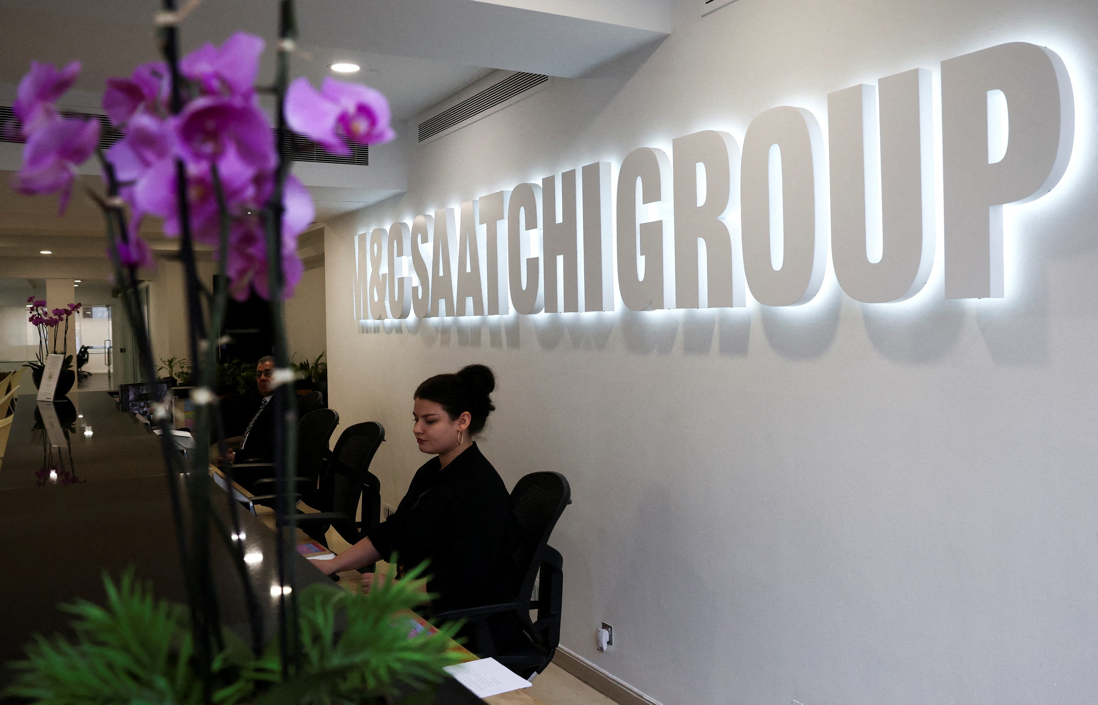 Signage is seen at the reception of the M&C Saatchi office in central London, Britain, January 6, 2022. REUTERS/Henry Nicholls