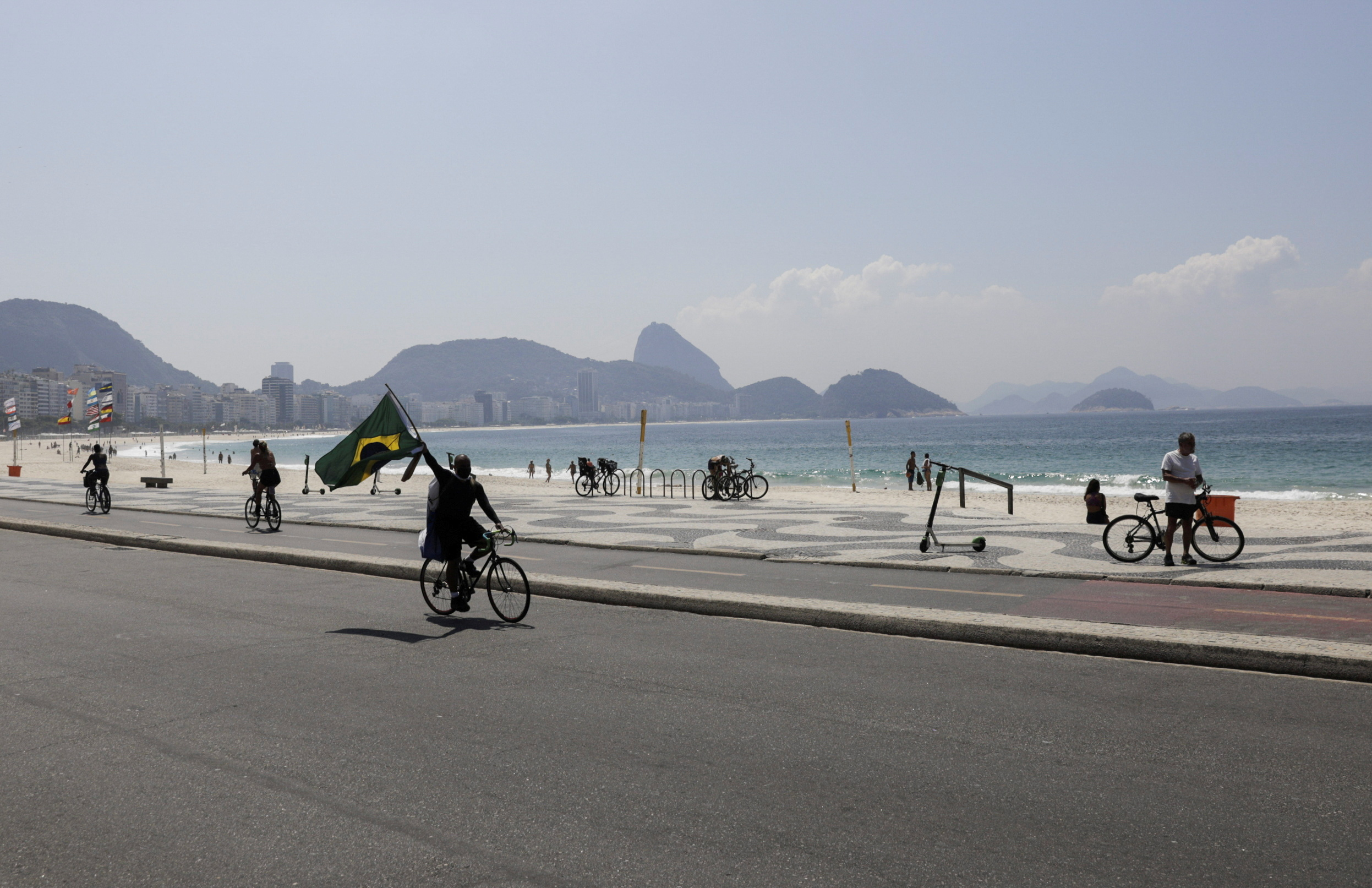 Brazil S Sao Paulo Rio De Janeiro Ease Restrictions Despite Record Covid Deaths Reuters