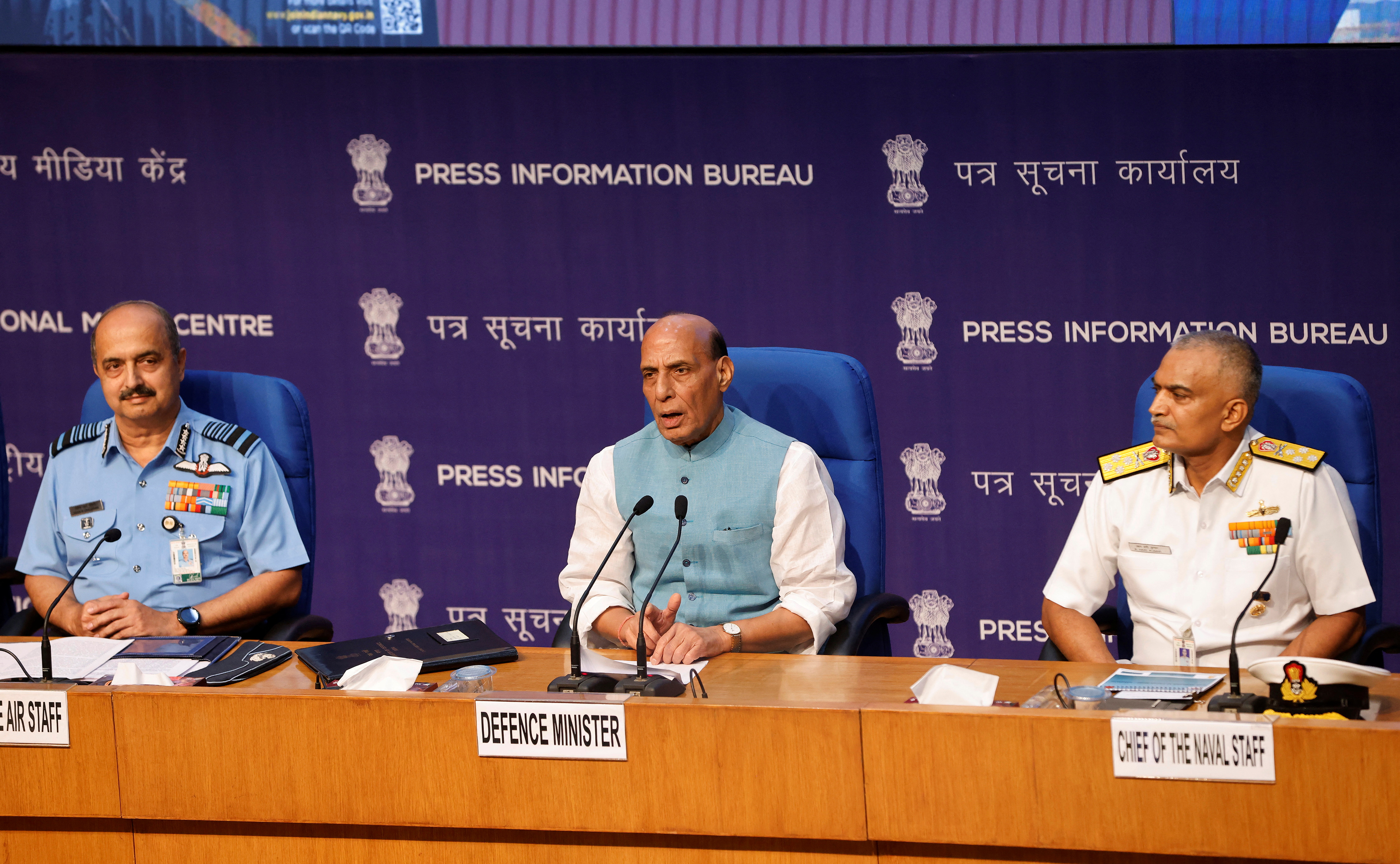 Indian Defence Minister Rajnath Singh addresses a news conference as Indian Air Chief Marshal Vivek Ram Chaudhari and Chief of Naval Staff Admiral R. Hari Kumar listen, in New Delhi