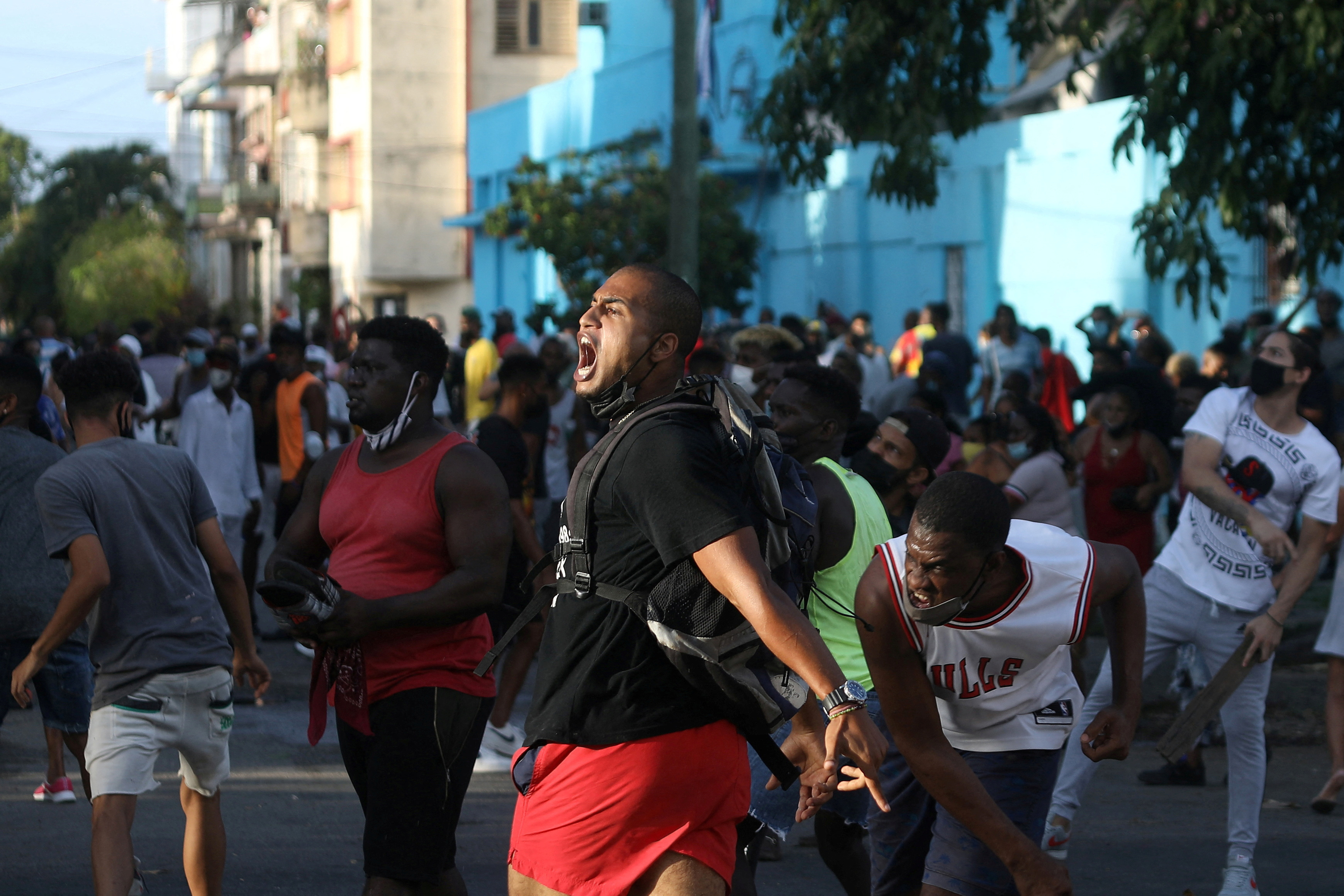 People shout slogans against the government during a protest in Havana