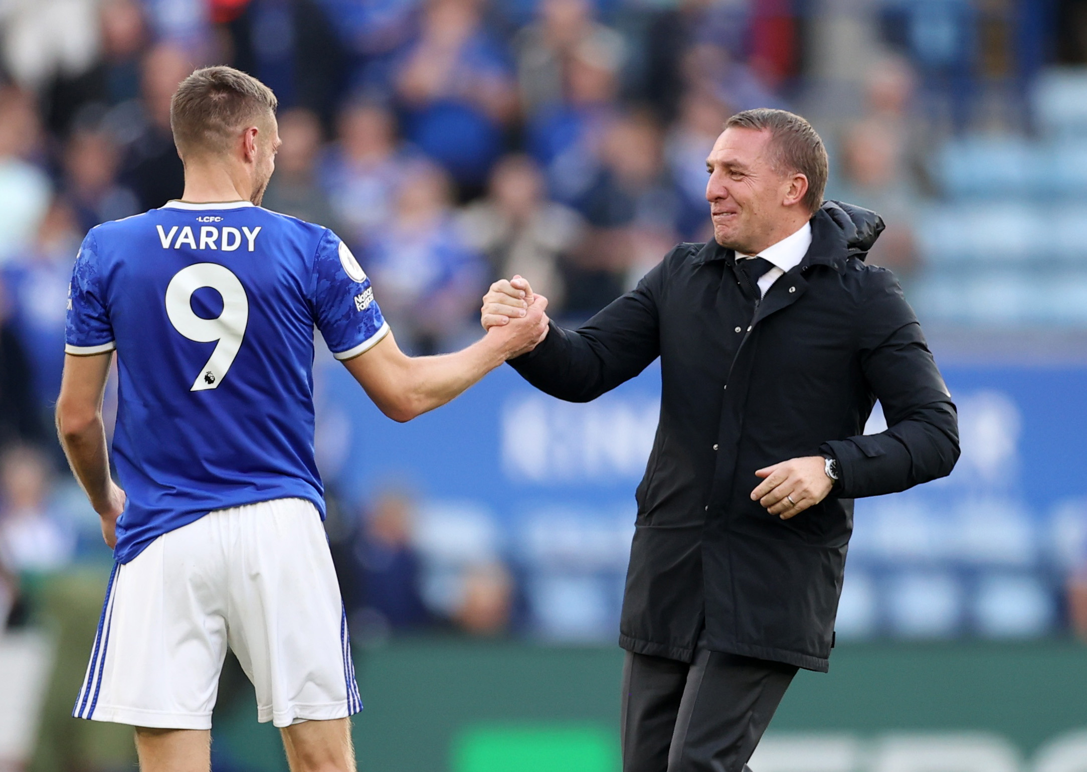 Soccer Football - Premier League - Leicester City v Manchester United - King Power Stadium, Leicester, Britain - October 16, 2021  Leicester City manager Brendan Rodgers celebrates after the match with Jamie Vardy Action Images via Reuters/Carl Recine 
