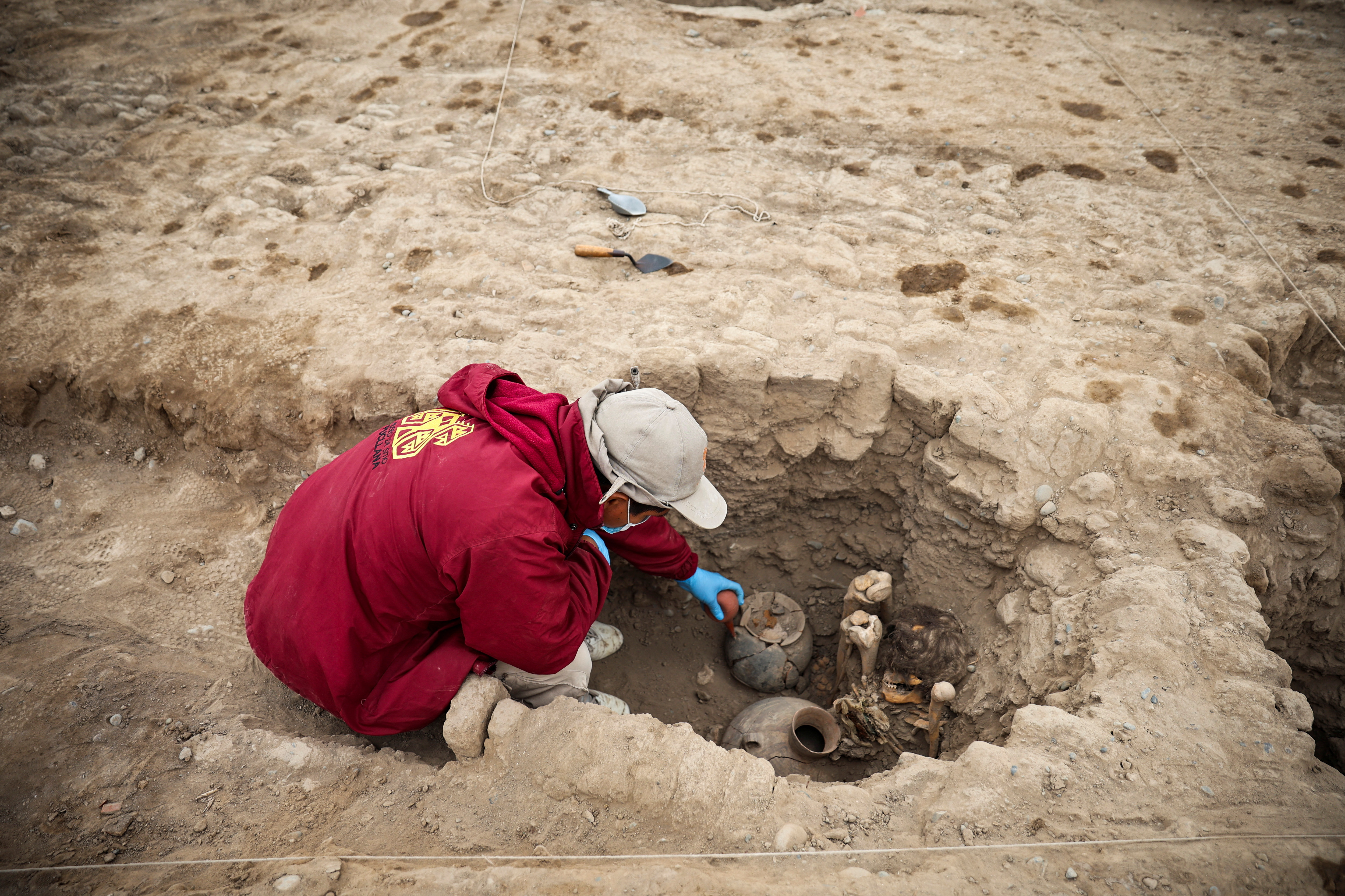 Archaeologists unearth 1,000-year-old mummy in Peru residential  neighborhood | Reuters