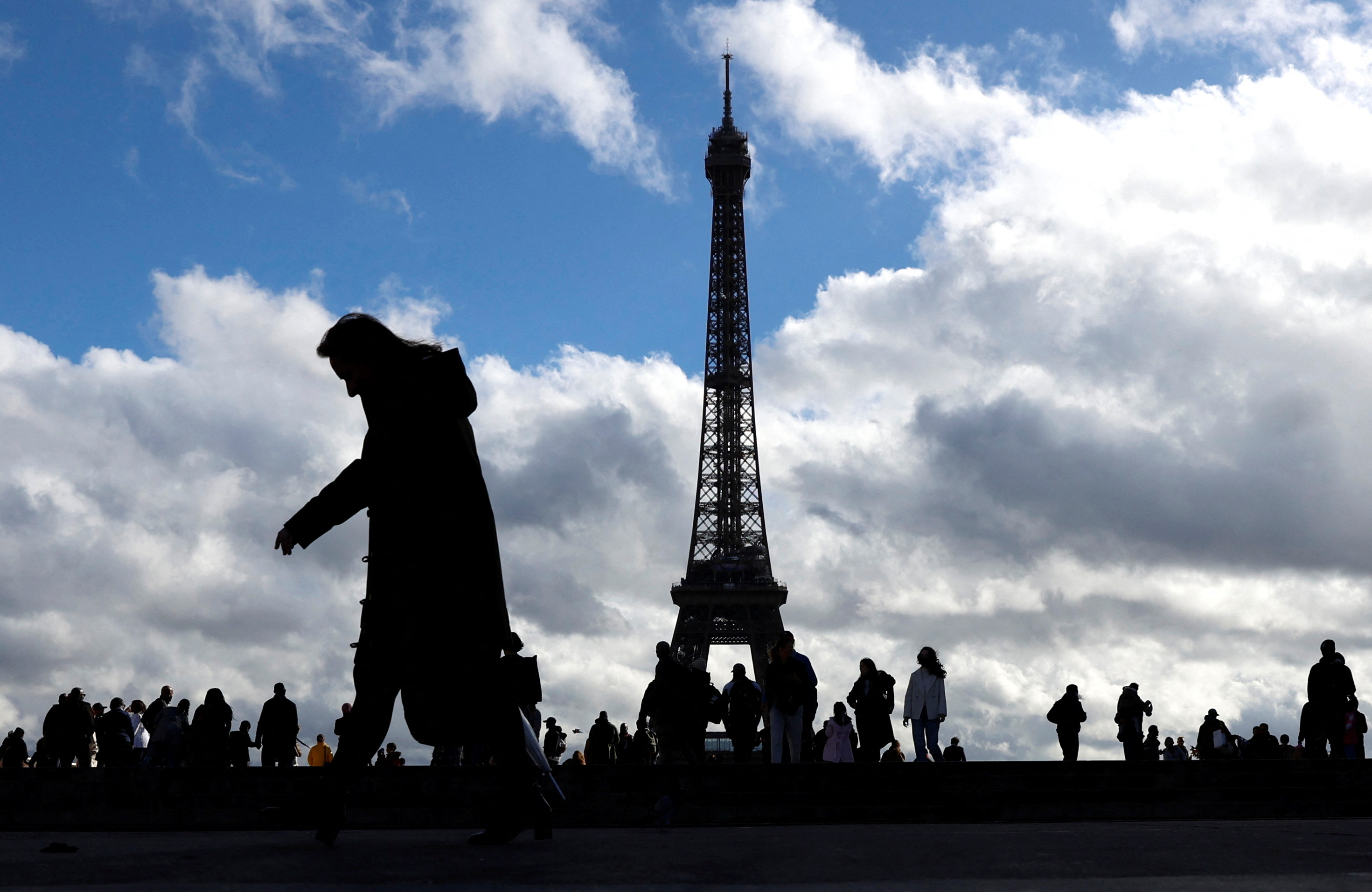 People take in views of the Eiffel Tower from the Trocadero, Paris