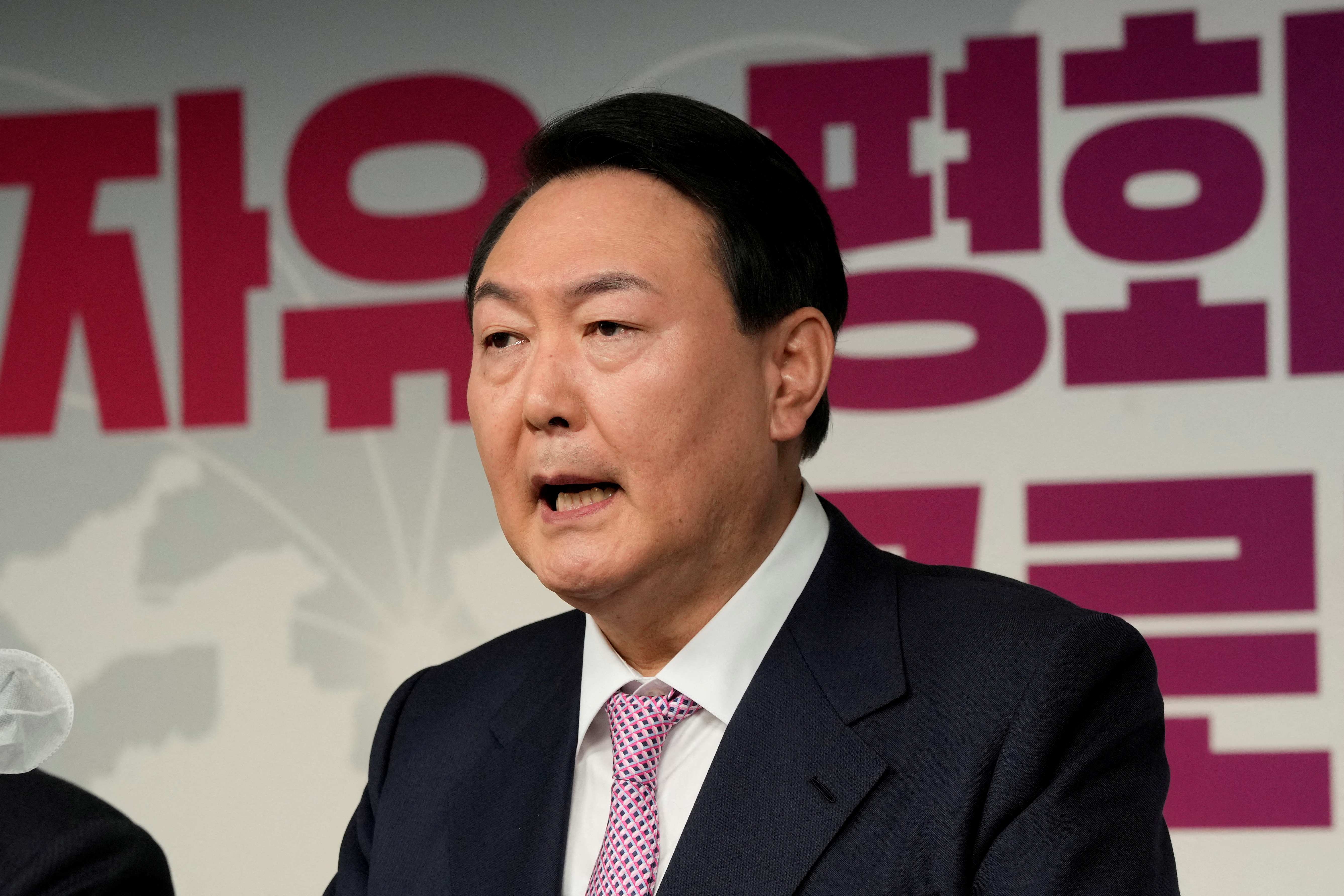 Yoon Suk-yeol, the presidential election candidate of South Korea's main opposition People Power Party (PPP), attends a news conference, in Seoul