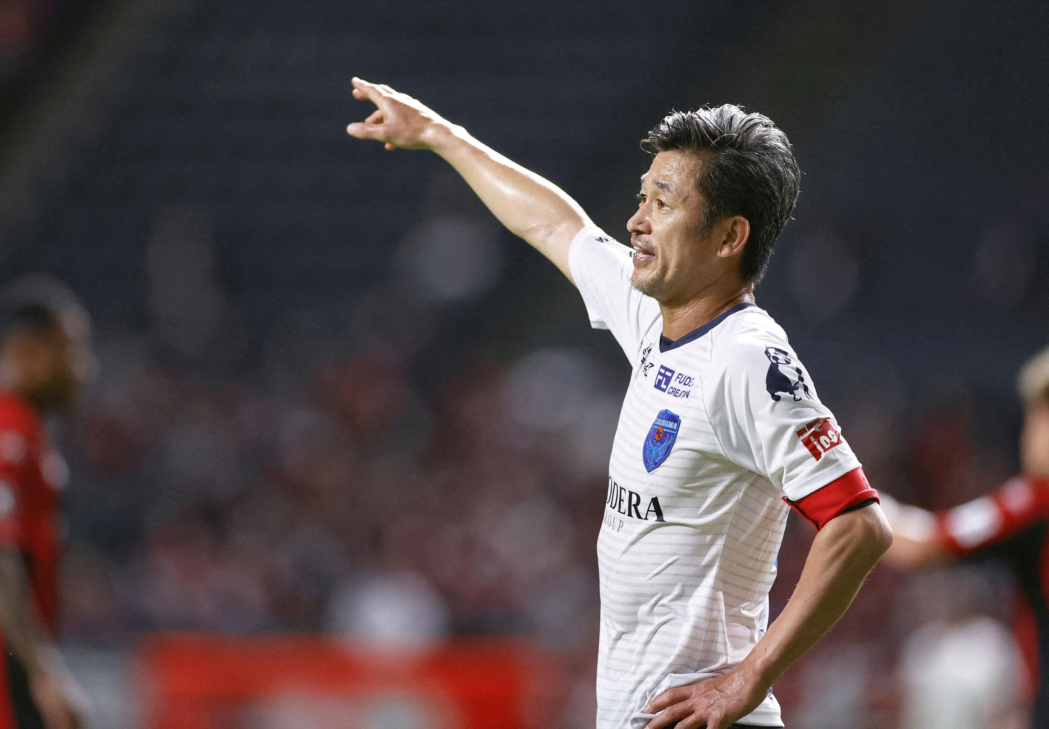 Yokohama FC's Japanese striker Kazuyoshi Miura gestures during J. League YBC Levain Cup soccer match against Hokkaido Consadole Sapporo in Sapporo, Japan