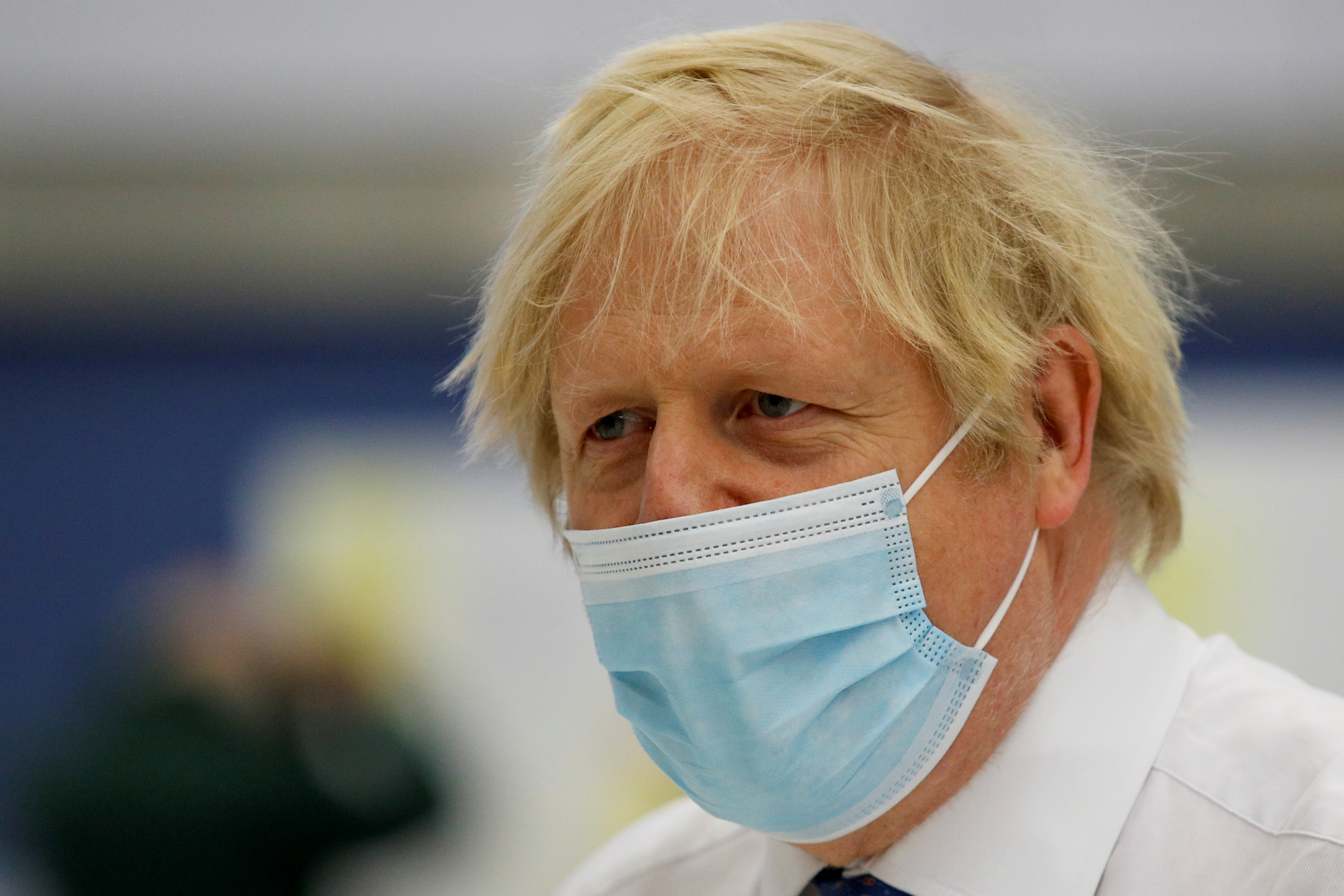 Britain's Prime Minister Boris Johnson visits a vaccination centre in Derby Arena, amidst the coronavirus disease (COVID-19) outbreak, in Derby, Britain February 8, 2021. REUTERS/Phil Noble/Pool   