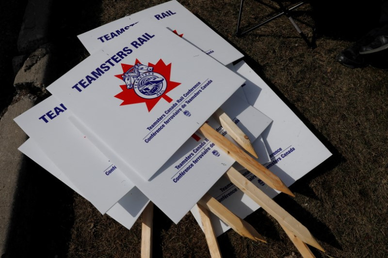 Teamsters union workers picket outside CP Rail's Toronto Yard