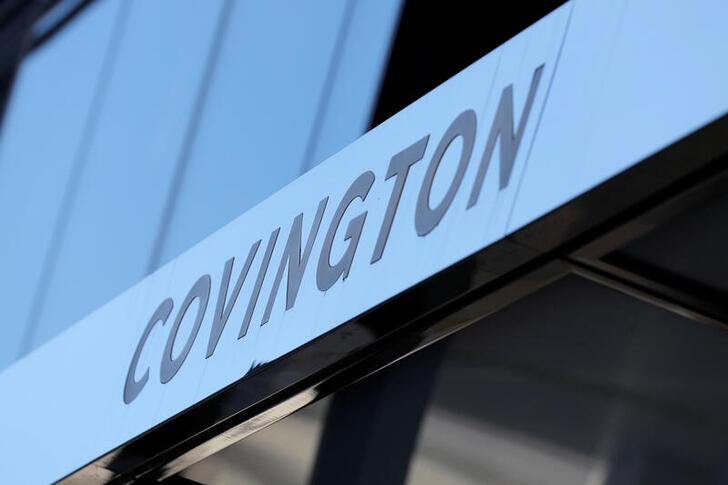 Signage is seen outside of the law firm Covington & Burling LLP in Washington, D.C.
