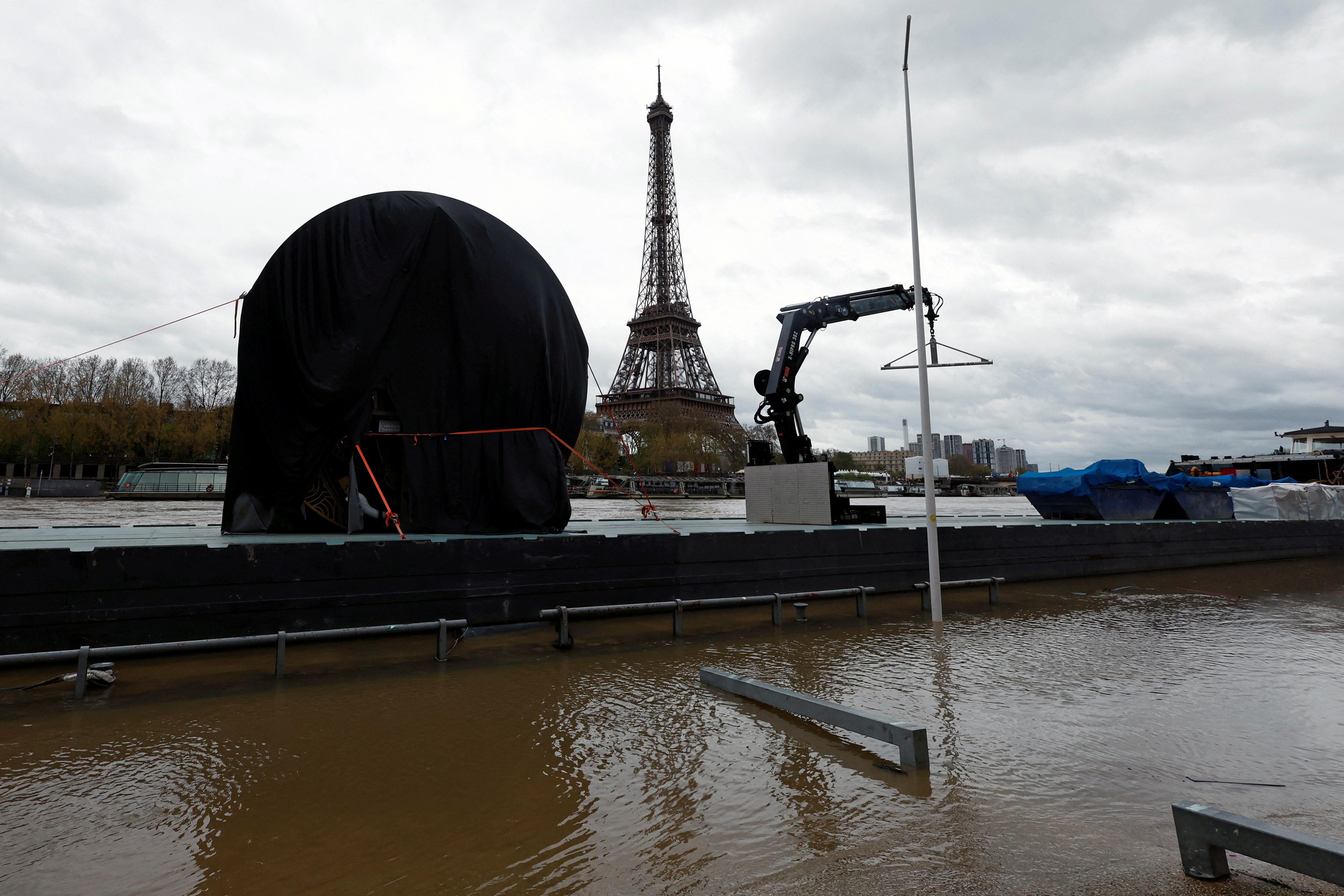 Paris 2024 Olympics countdown clock moved and covered as River Seine waters rise