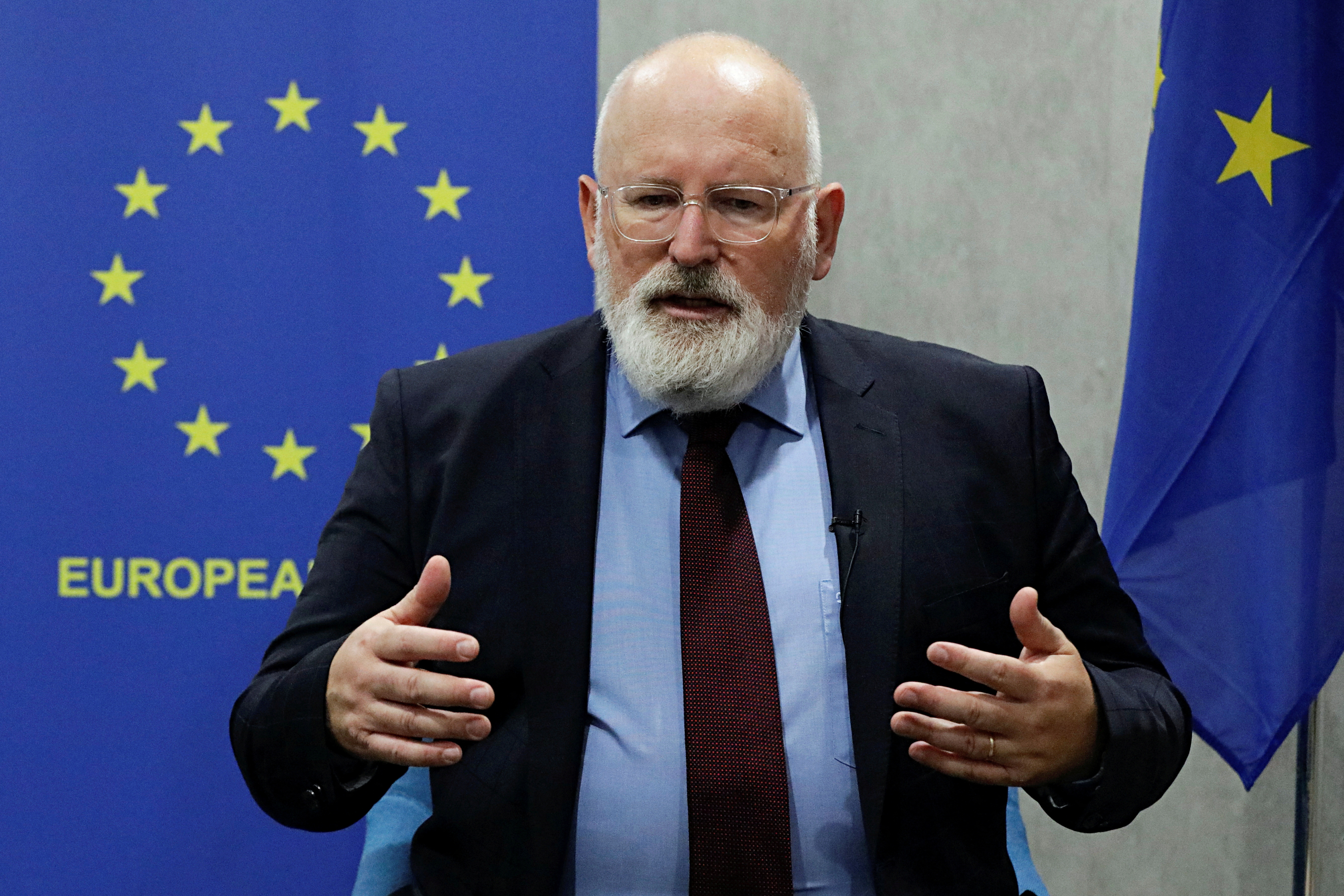 Frans Timmermans gestures as he speaks during an interview at EU Delegation office in Jakarta