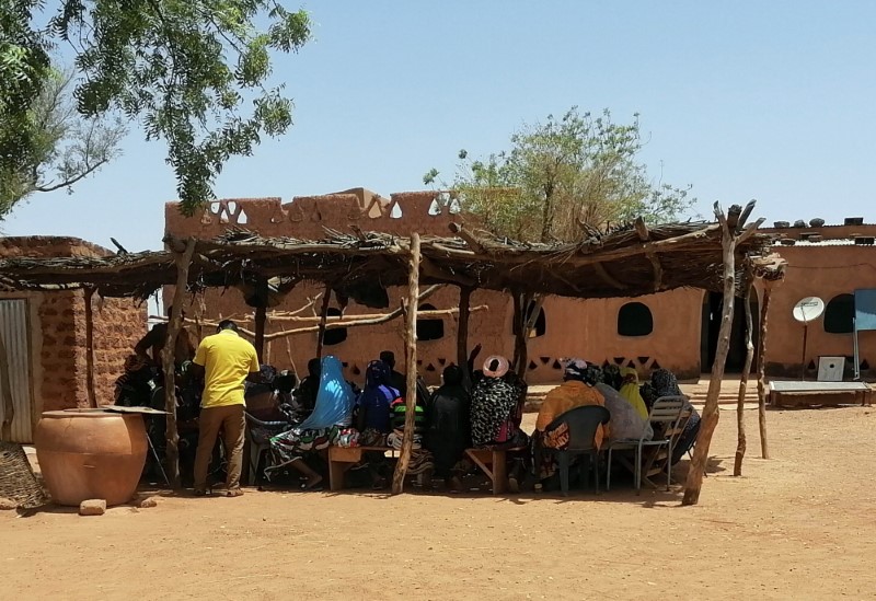 Women are pictured in the yard of the Emir Djibril Diallo, chief negotiator in the talks between the jihadists and the Thiou population, in Thiou